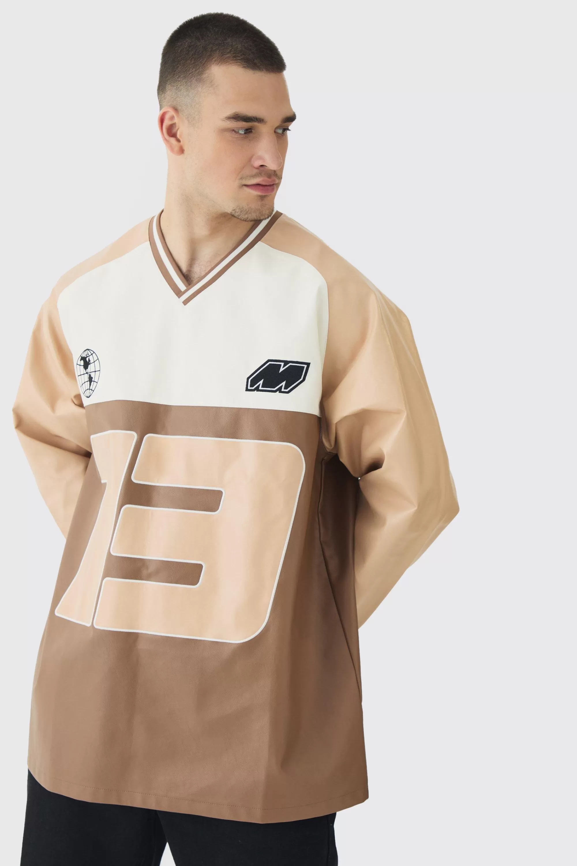 boohooMAN Tall Oversized Pu Raglan Embroidered Varsity Sweater | UK