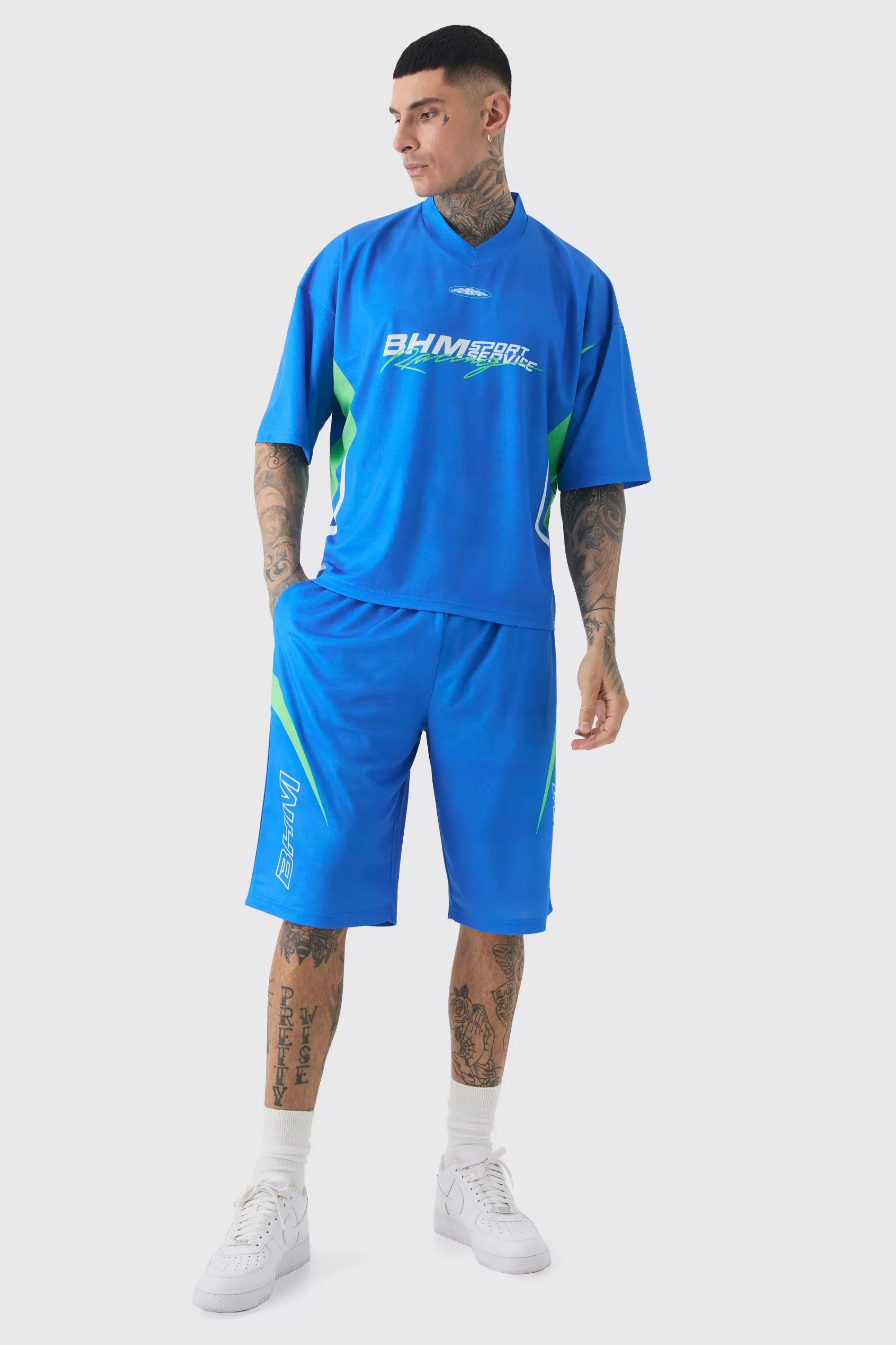 boohooMAN Tall Oversized V Neck Mesh Moto Printed T-shirt & Short Set | UK