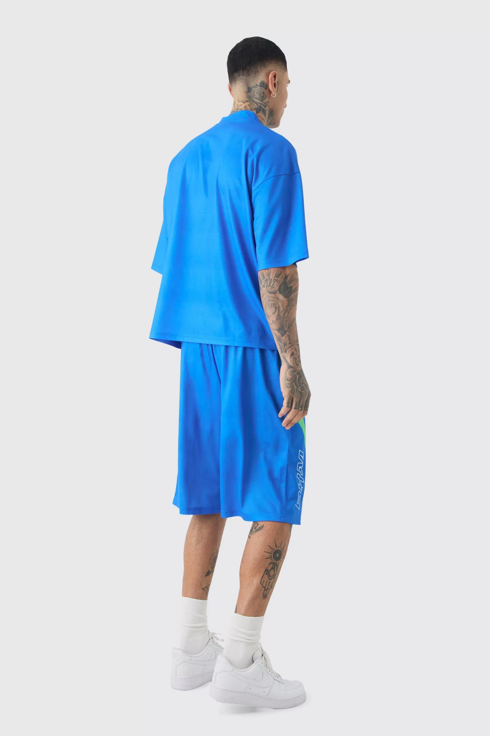 boohooMAN Tall Oversized V Neck Mesh Moto Printed T-shirt & Short Set | UK