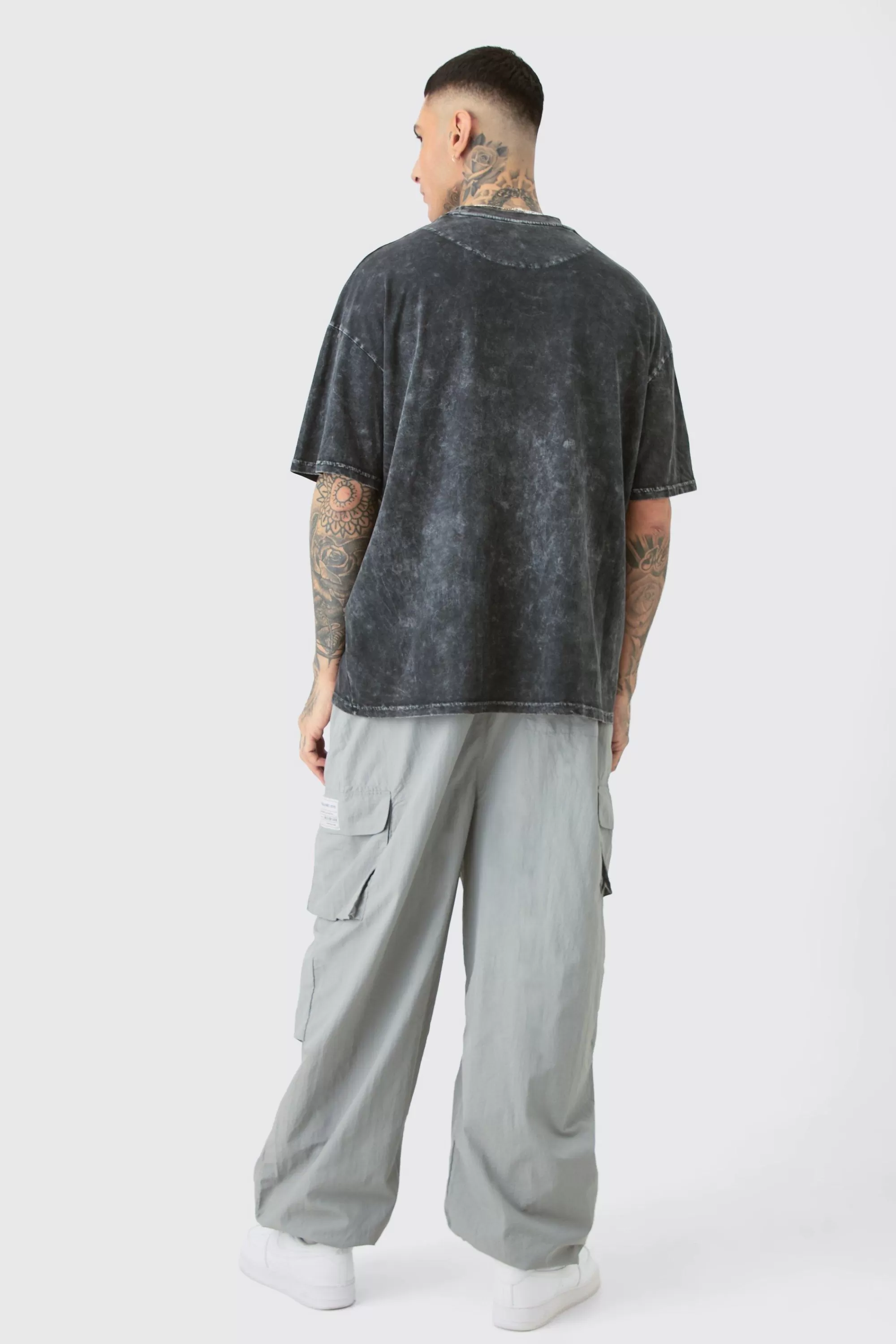 boohooMAN Tall Pleat Knee Branded Parachute Pants | UK
