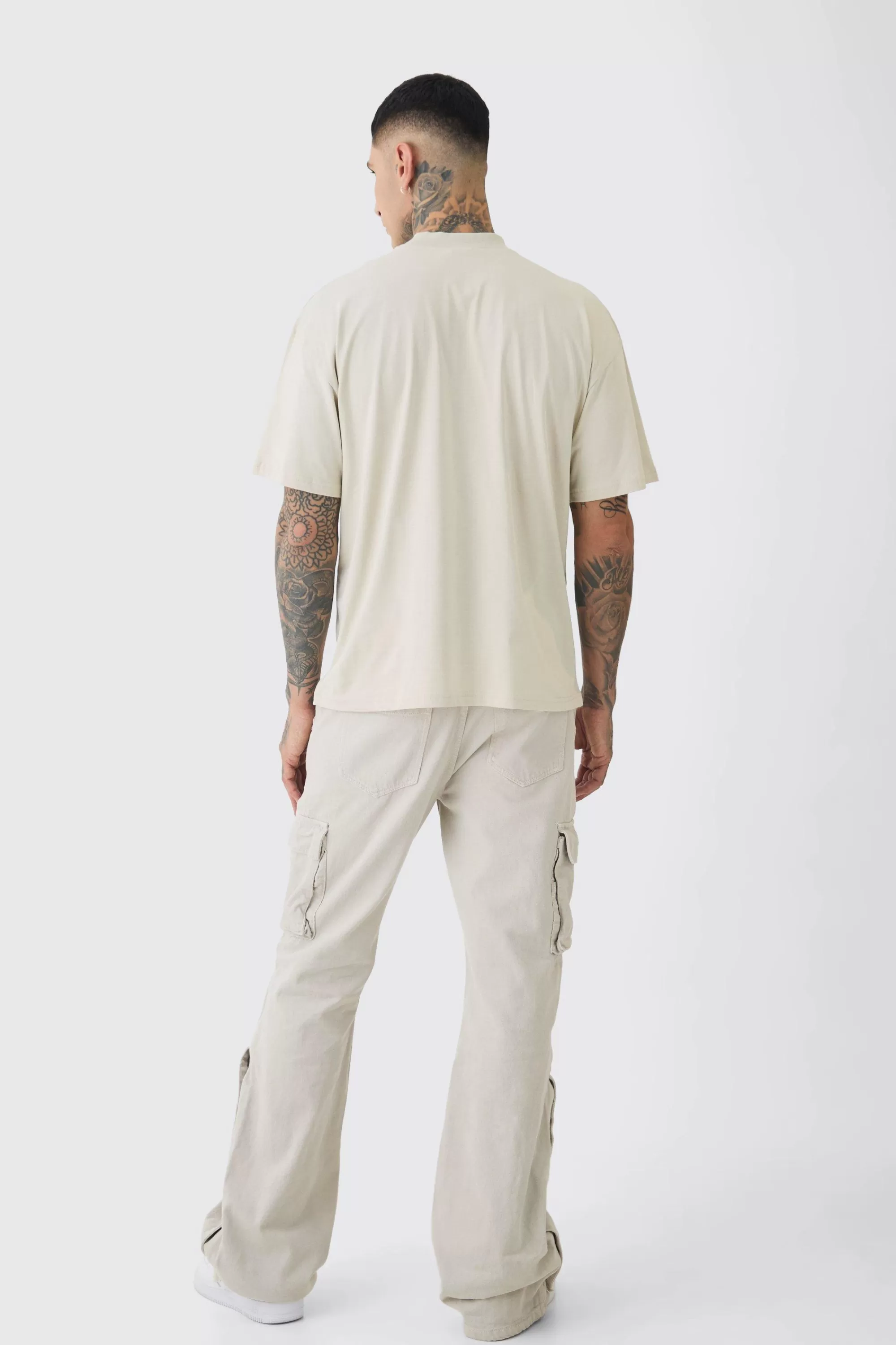 boohooMAN Tall Relaxed Flare Overdye Popper Hem Cargo Trouser In | UK