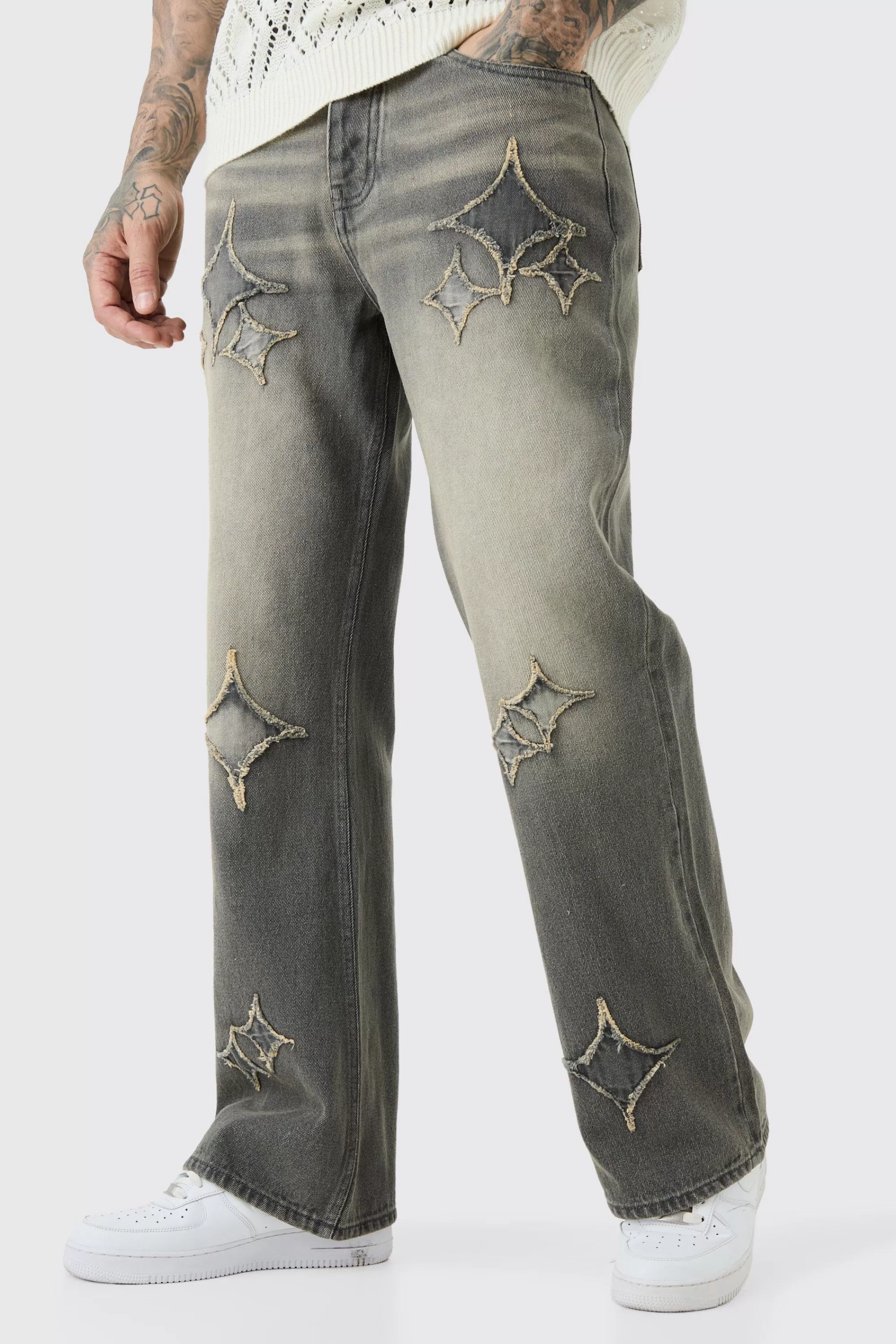 boohooMAN Tall Relaxed Rigid Flare Self Fabric Applique Gusset Jeans | UK