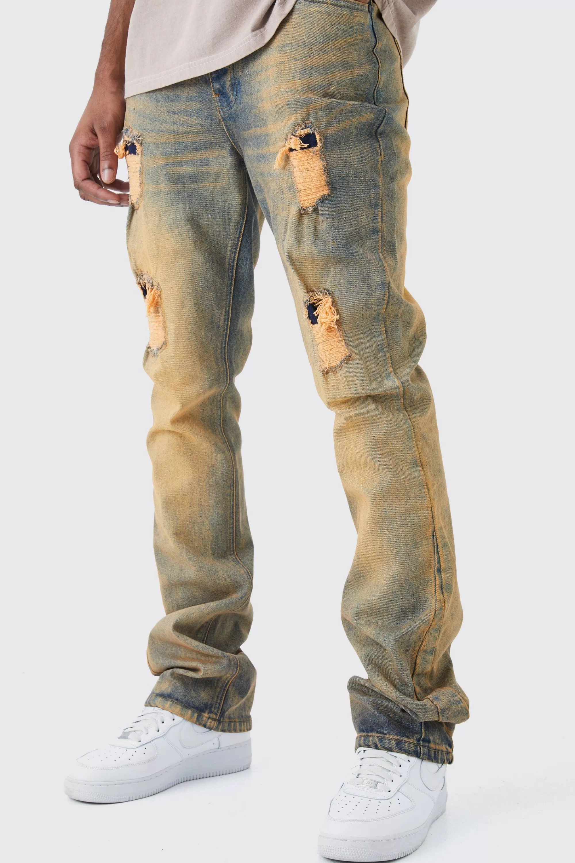 boohooMAN Tall Slim Flare Stretch Multi Rip & Repair Jean | UK