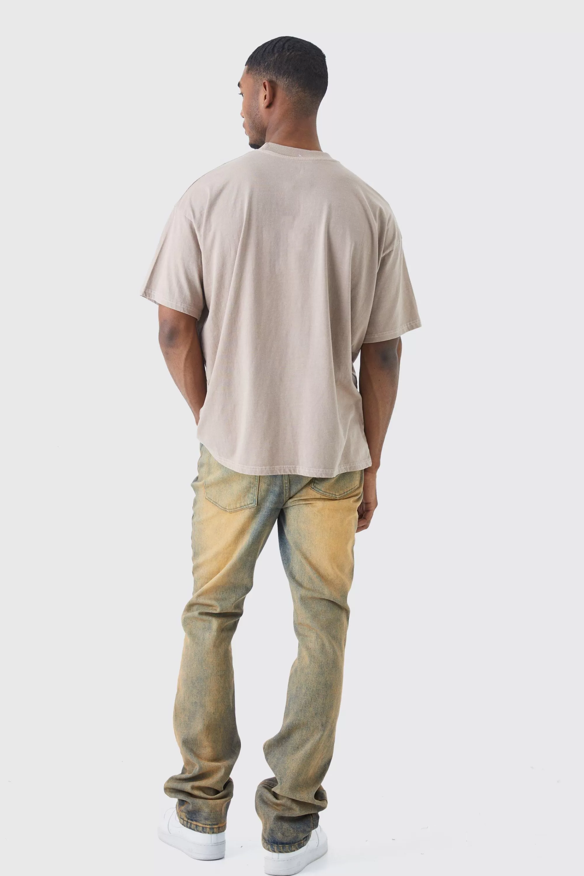 boohooMAN Tall Slim Flare Stretch Multi Rip & Repair Jean | UK
