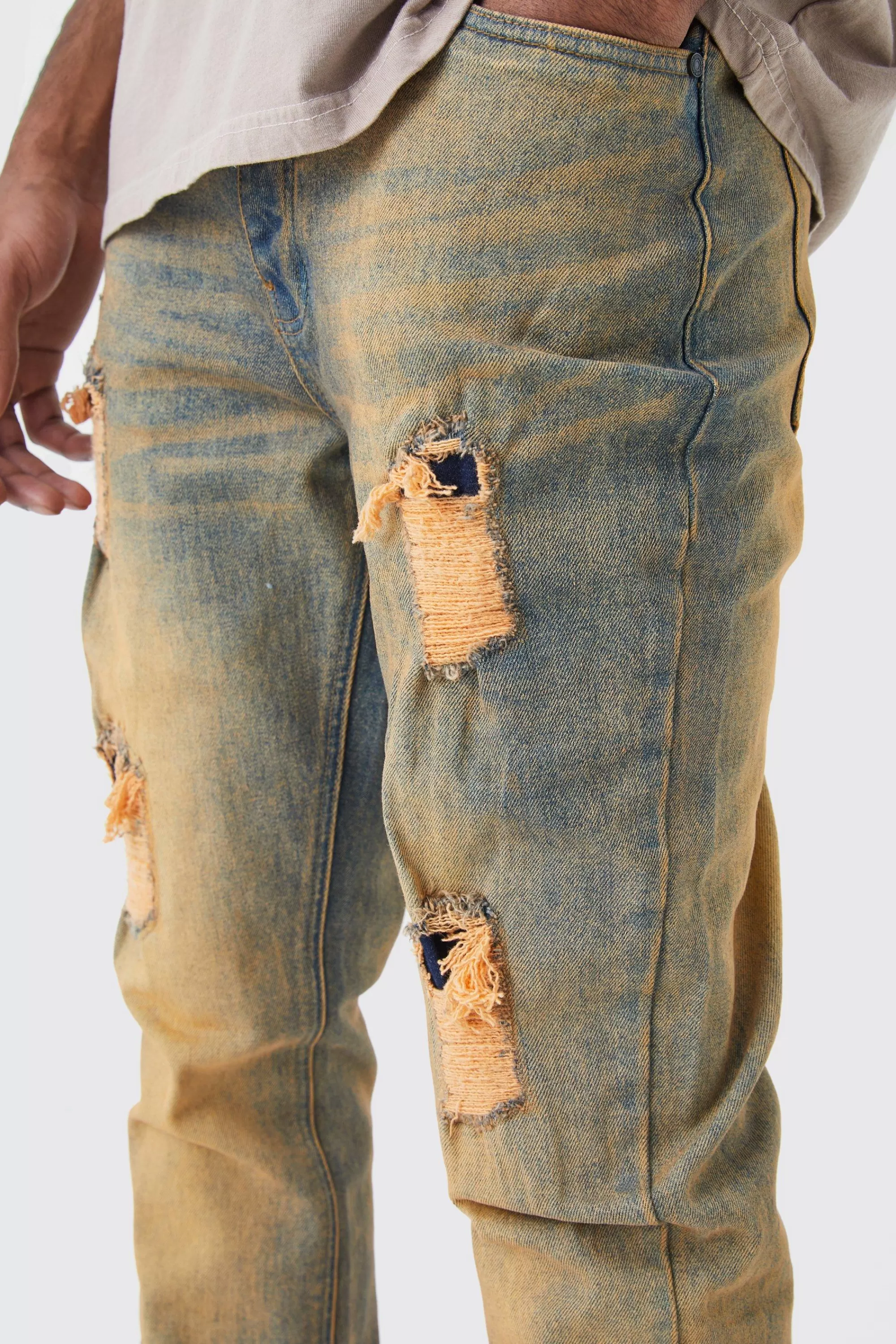 boohooMAN Tall Slim Flare Stretch Multi Rip & Repair Jean | UK