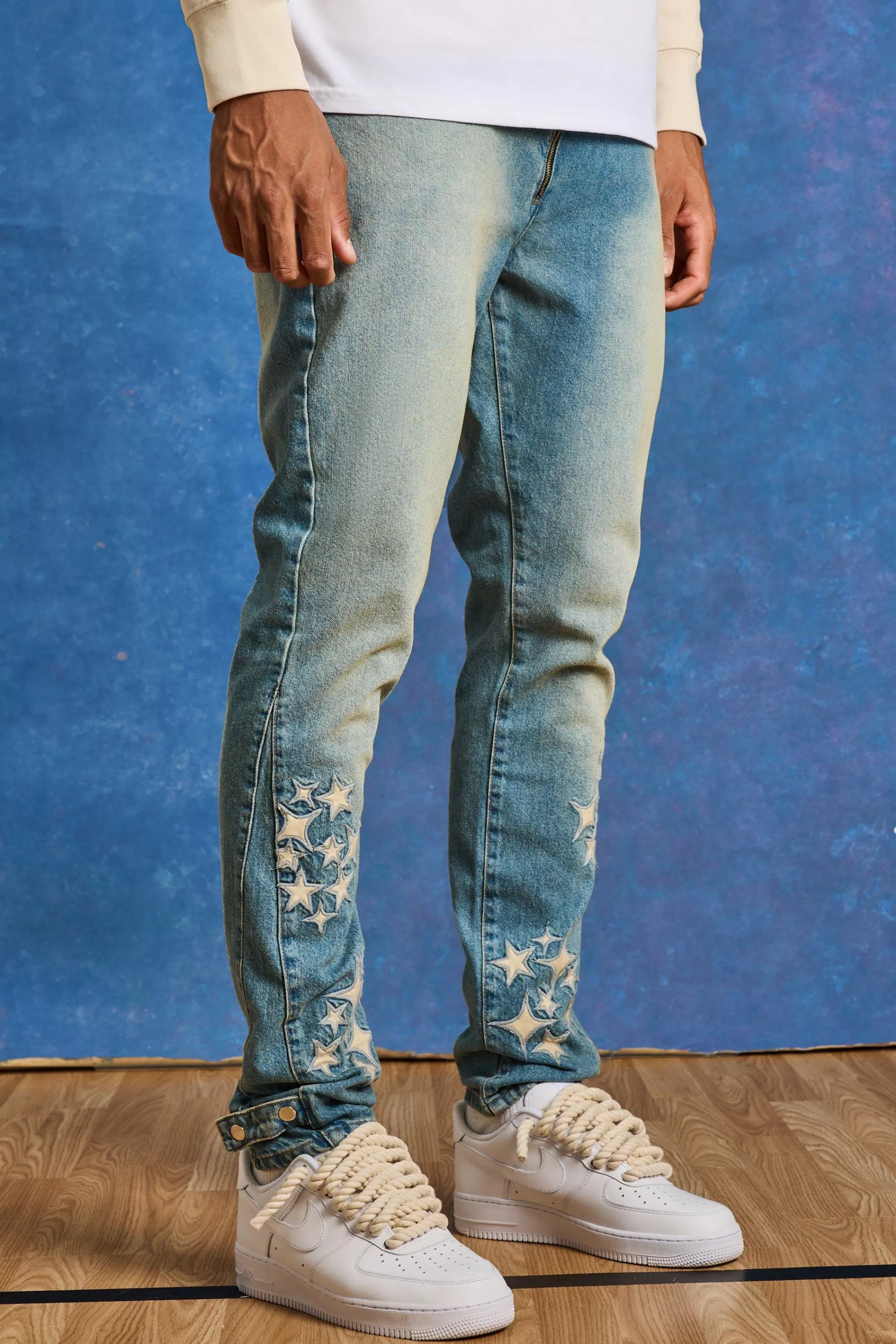 boohooMAN Tall Slim Rigid Pu Star Applique Gusset Jeans | UK