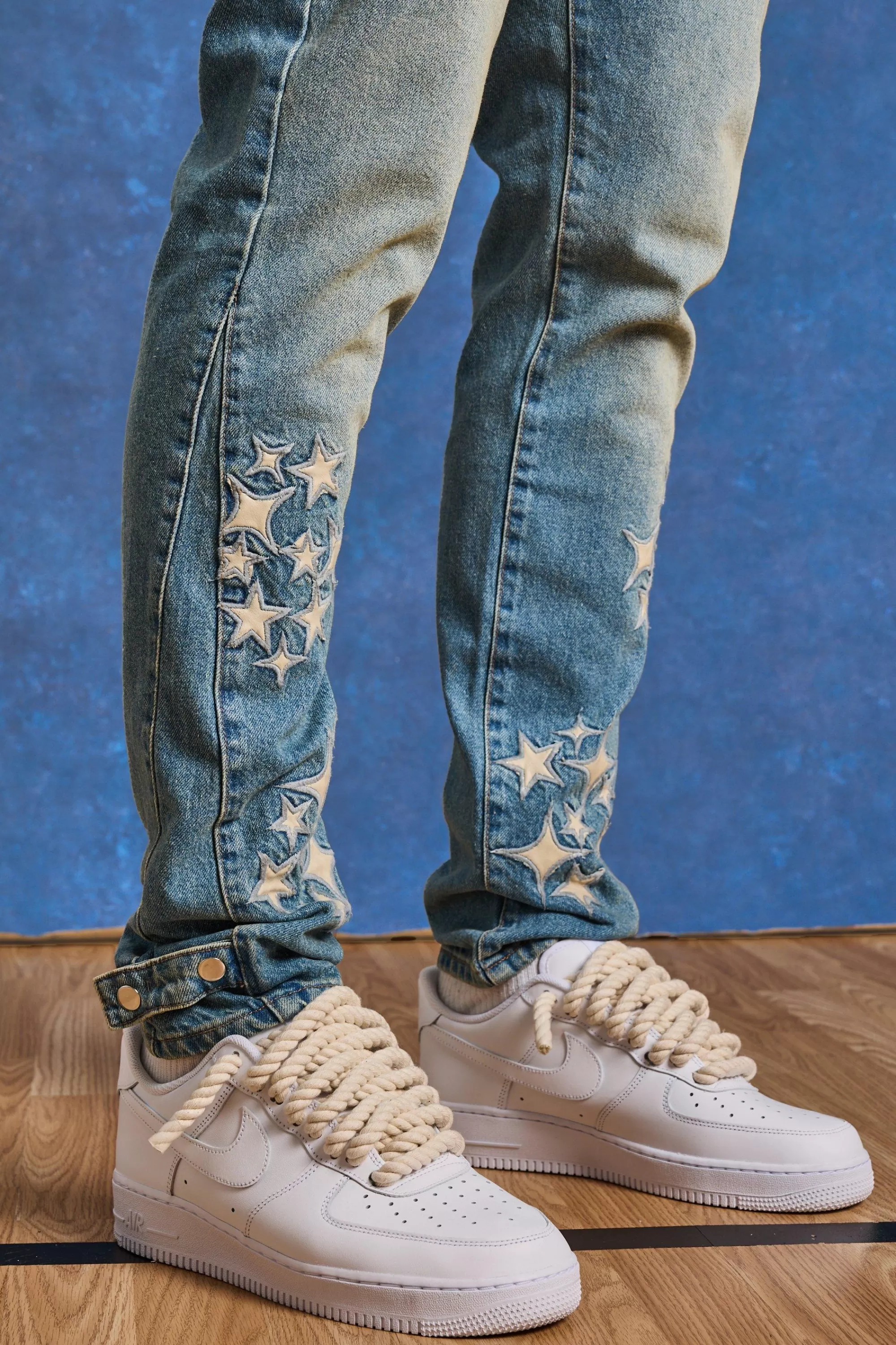 boohooMAN Tall Slim Rigid Pu Star Applique Gusset Jeans | UK