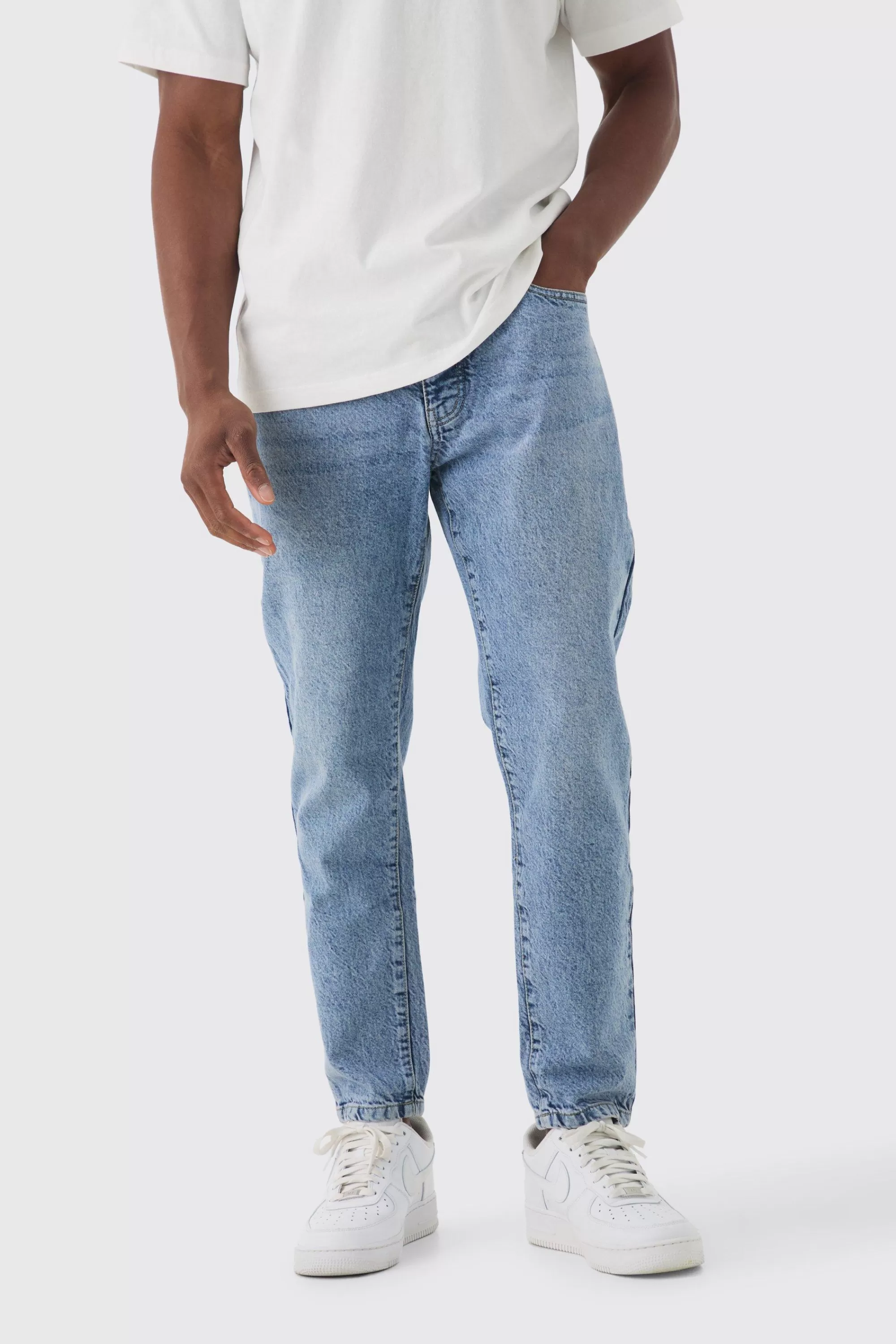 boohooMAN Tapered Fit Rigid Jeans | UK