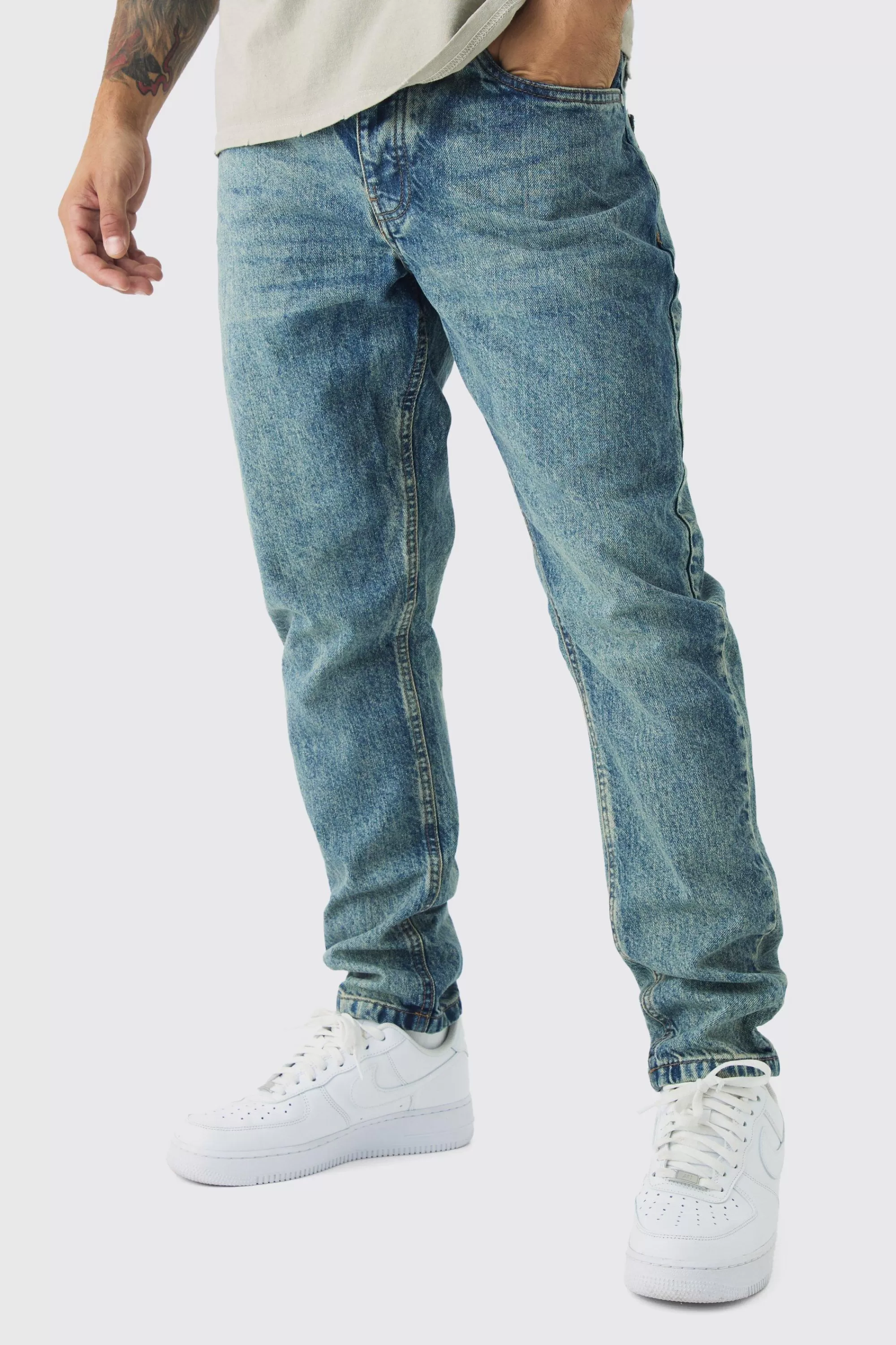boohooMAN Tapered Rigid Jean In | UK