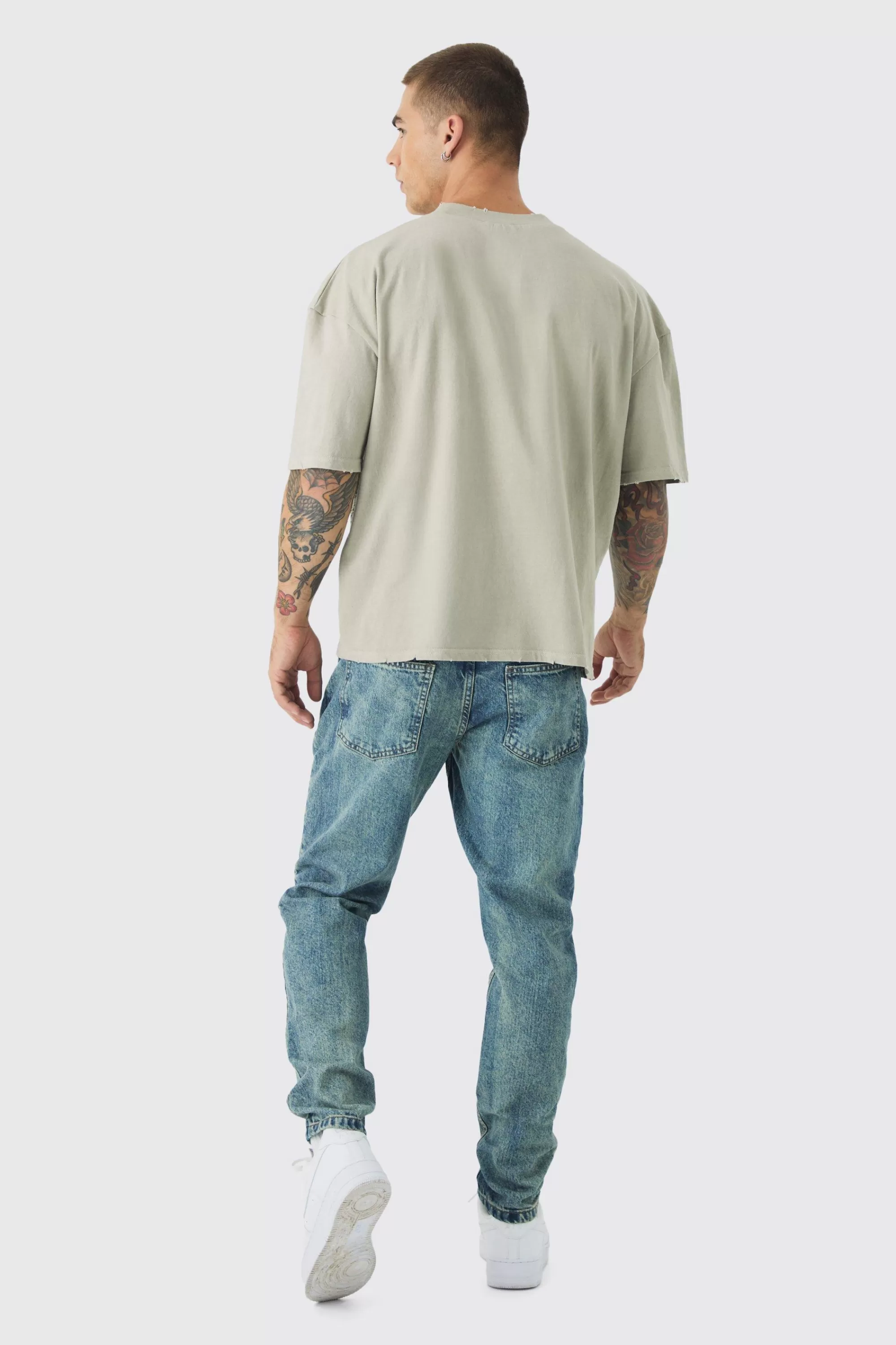 boohooMAN Tapered Rigid Jean In | UK