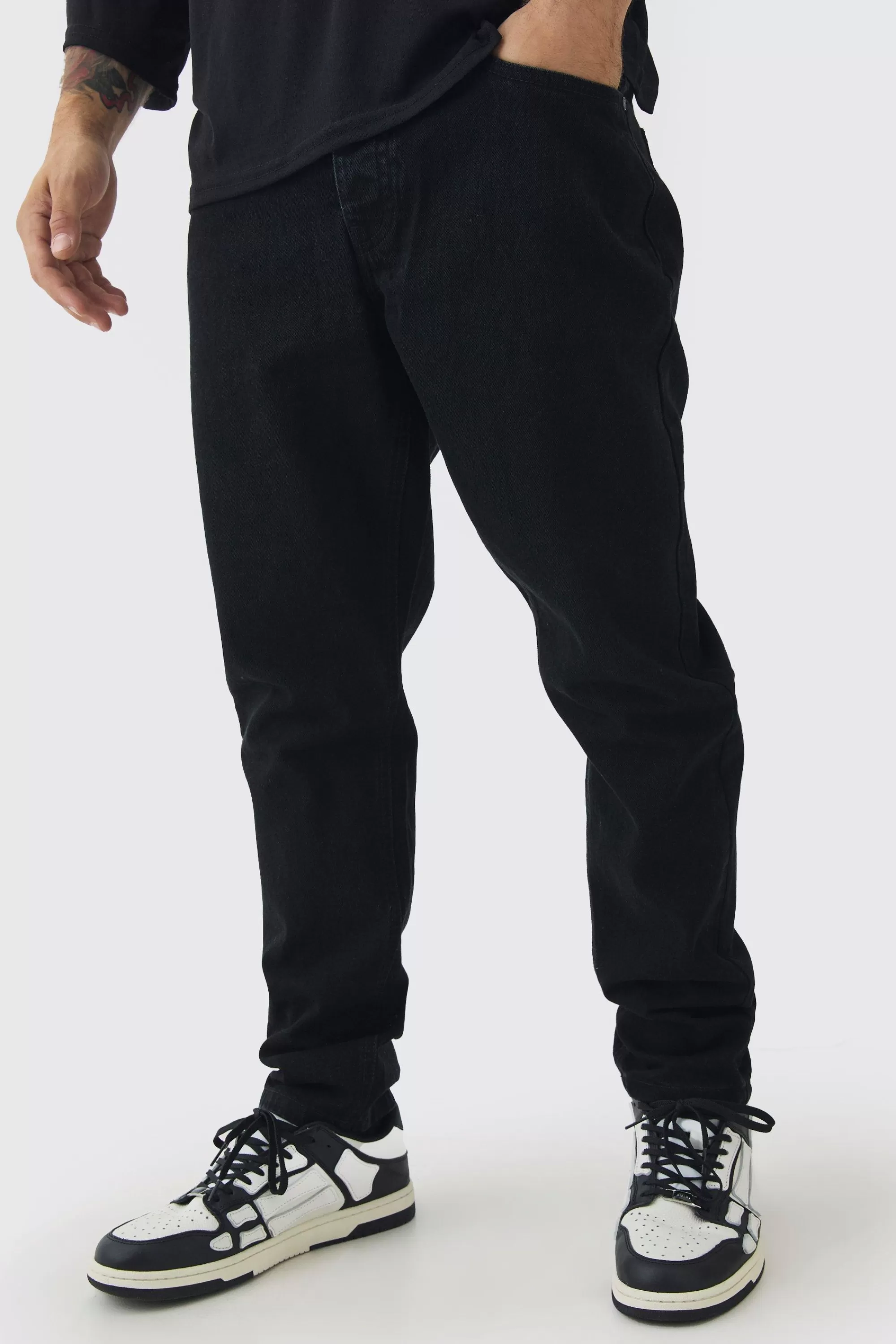 boohooMAN Tapered Rigid Jean In | UK