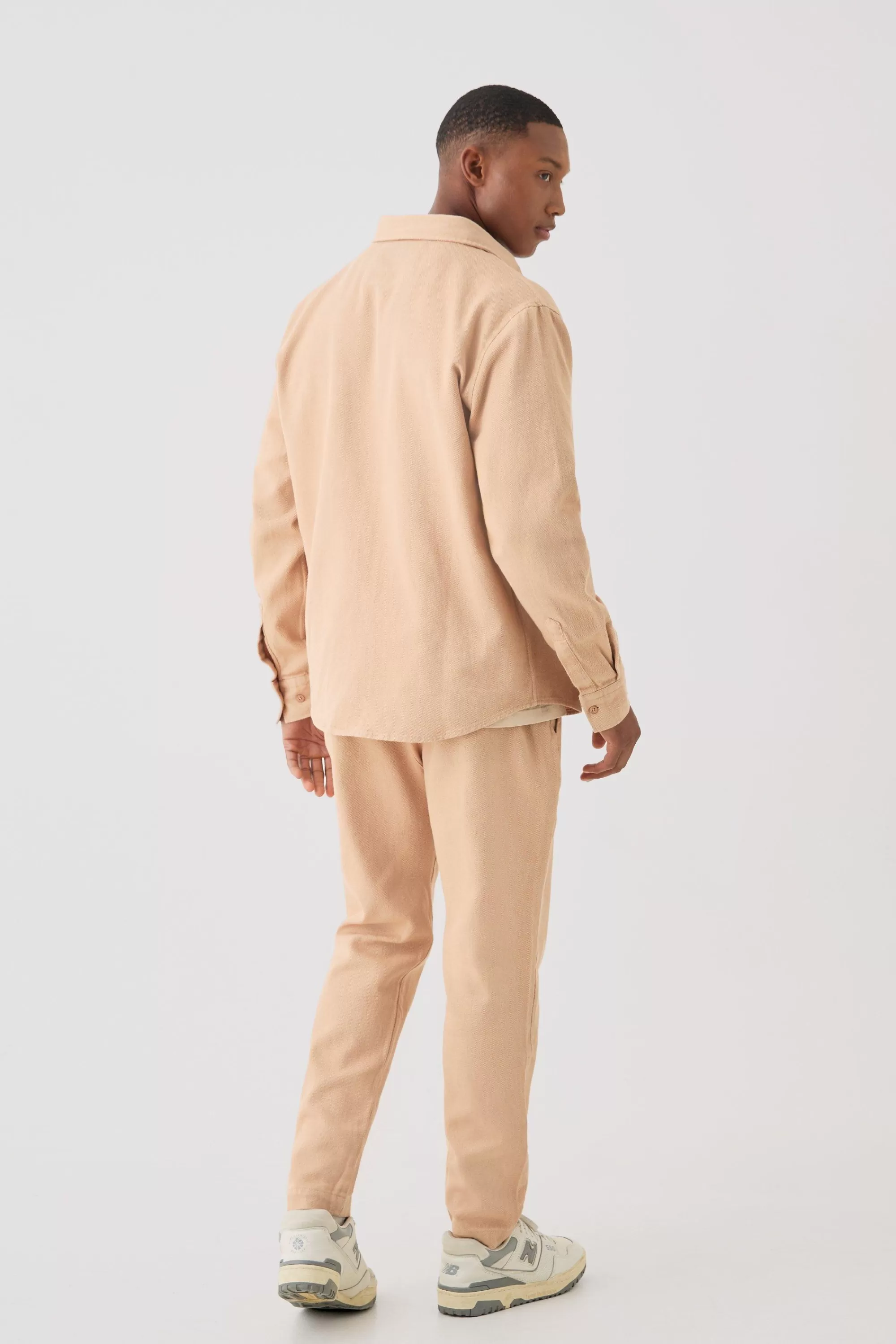 boohooMAN Textured Elasticated Waist Straight Fit Trousers | UK