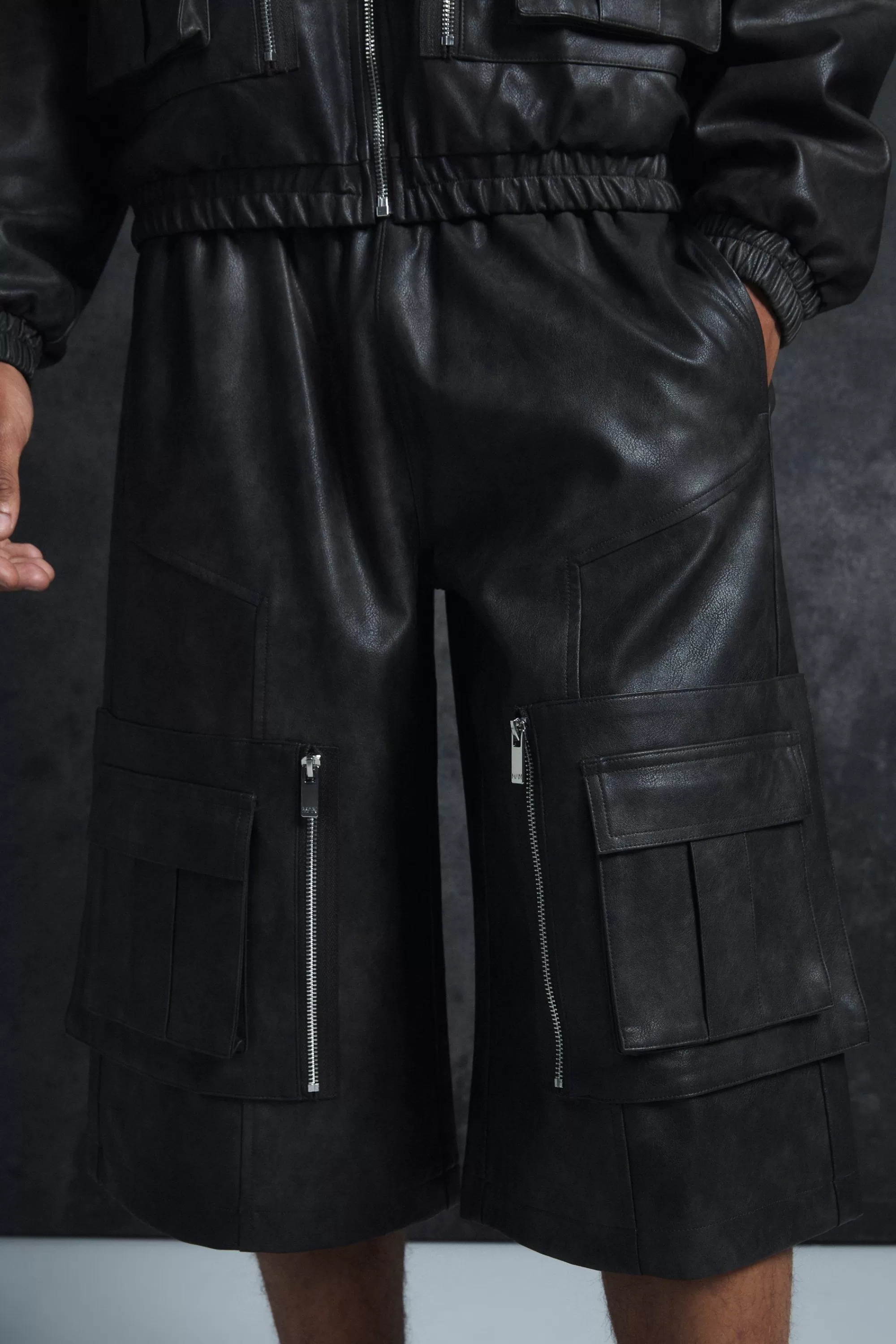 boohooMAN Trippie Redd Relaxed Longline Washed Pu Cargo Jorts In | UK