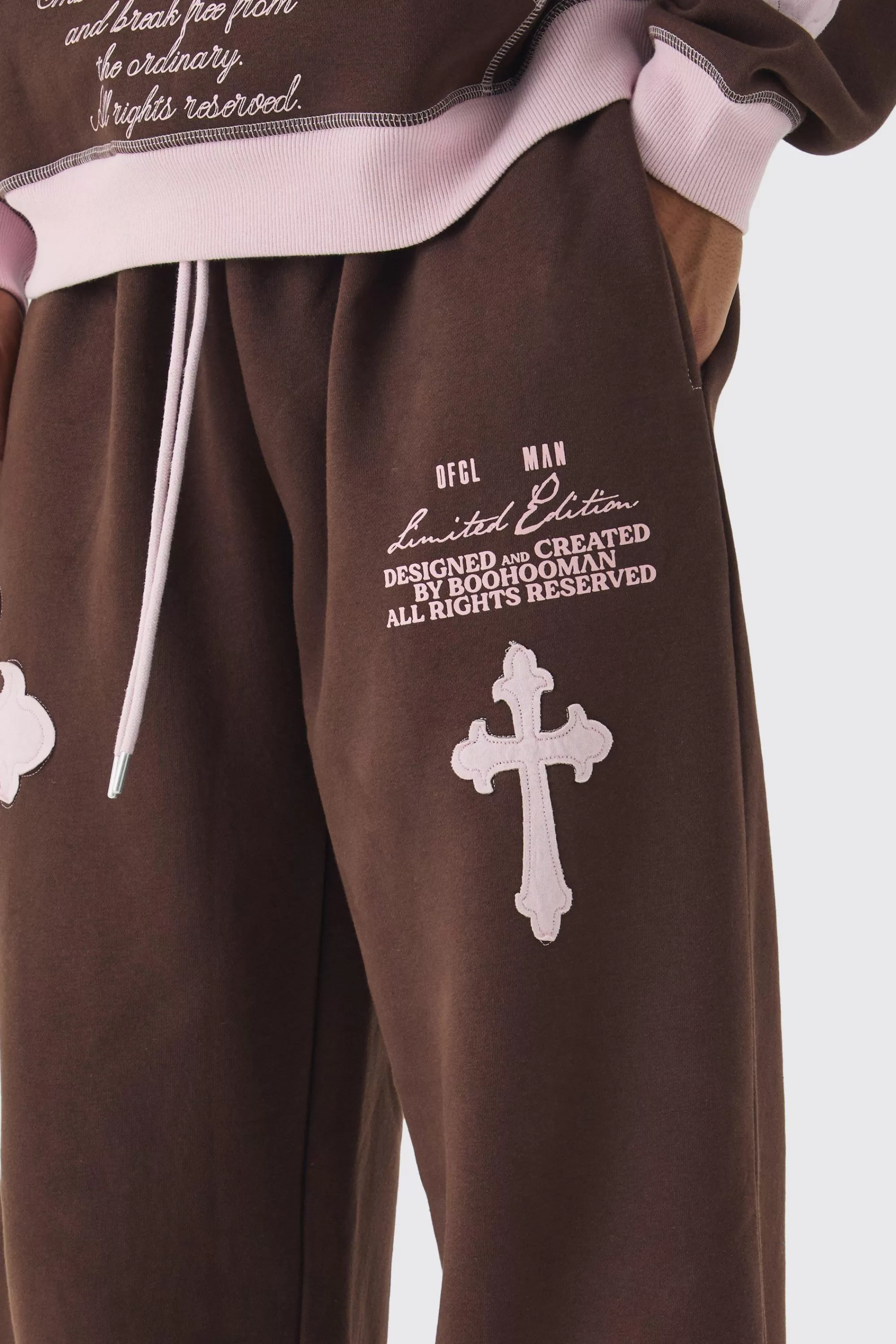 boohooMAN Wide Leg Limited Edition Cross Applique Joggers | UK