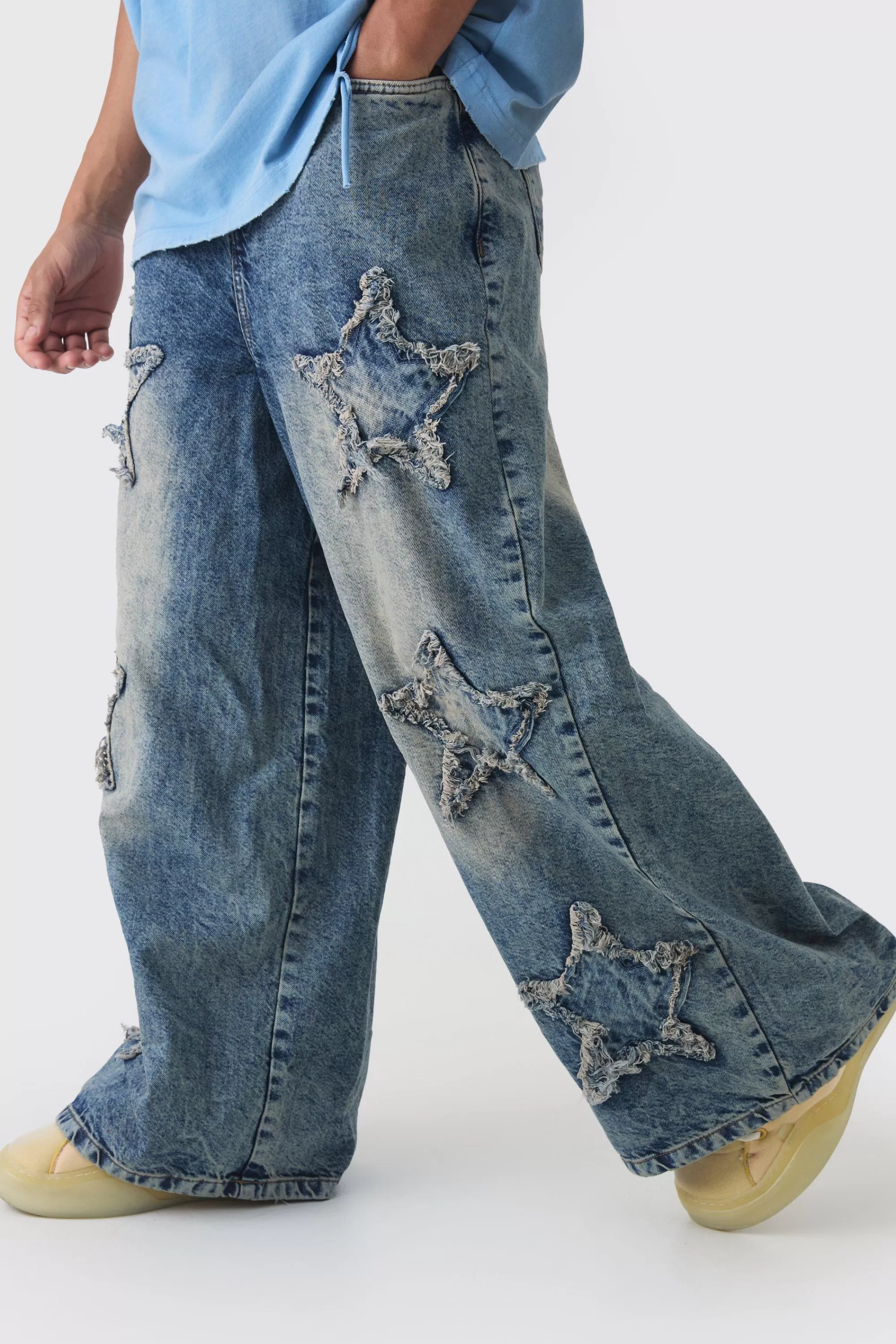 boohooMAN Wide Leg Rigid Star Distressed Applique Jeans | UK