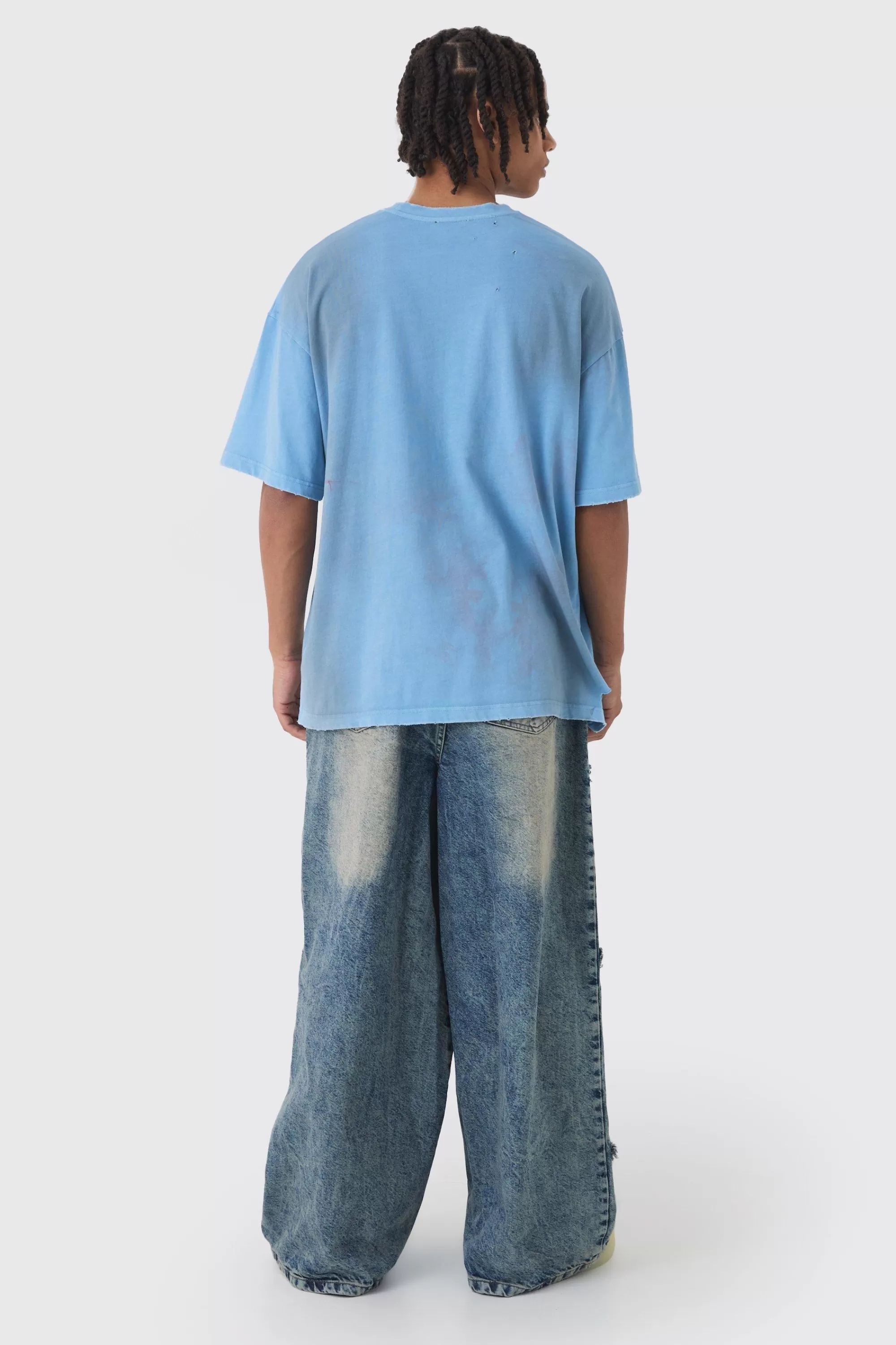 boohooMAN Wide Leg Rigid Star Distressed Applique Jeans | UK