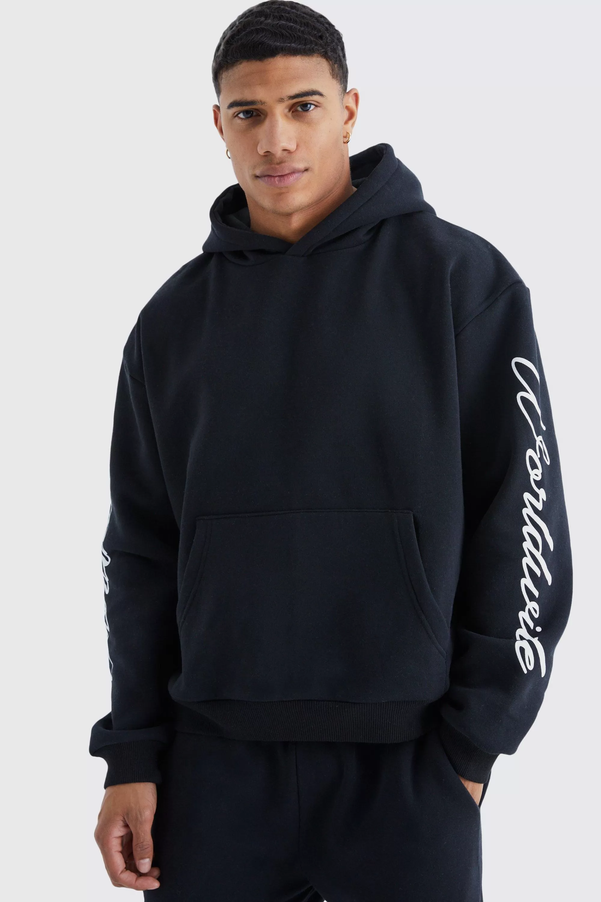 boohooMAN Worldwide Placement Printed Gusset Tracksuit | UK