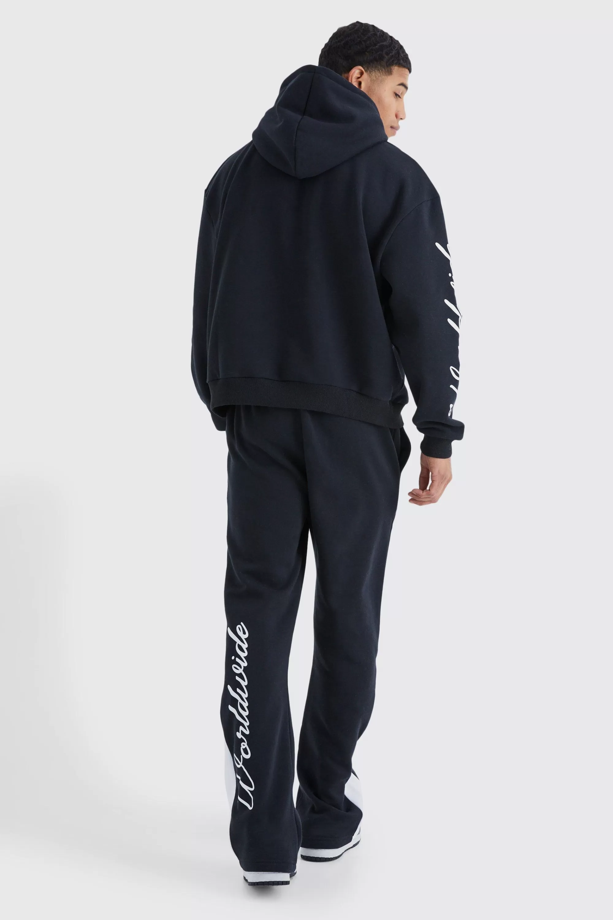 boohooMAN Worldwide Placement Printed Gusset Tracksuit | UK