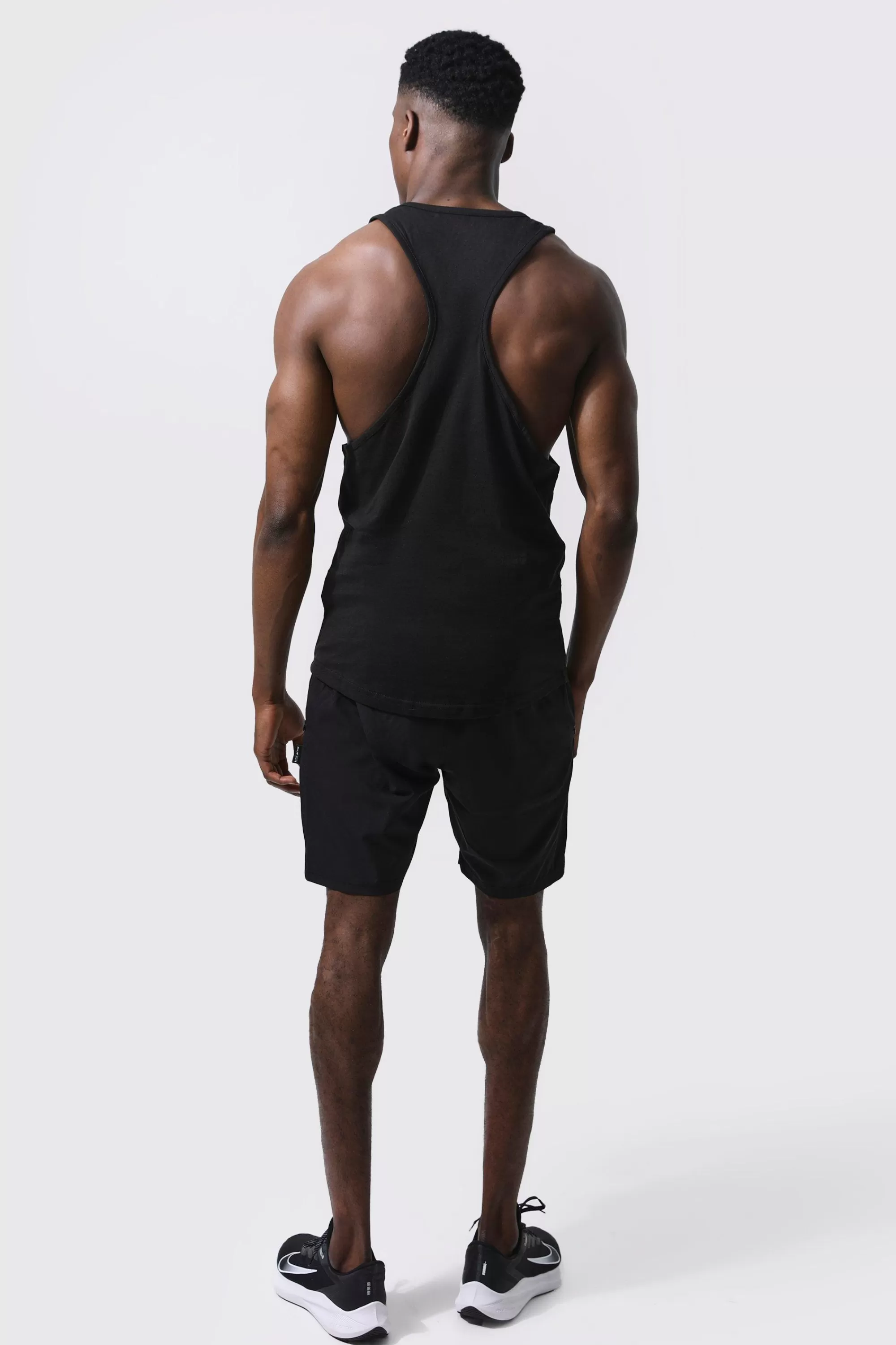 boohooMAN Man Active Gym 2 Pack Gym Regular Fit Racer Vests | UK multi Shop