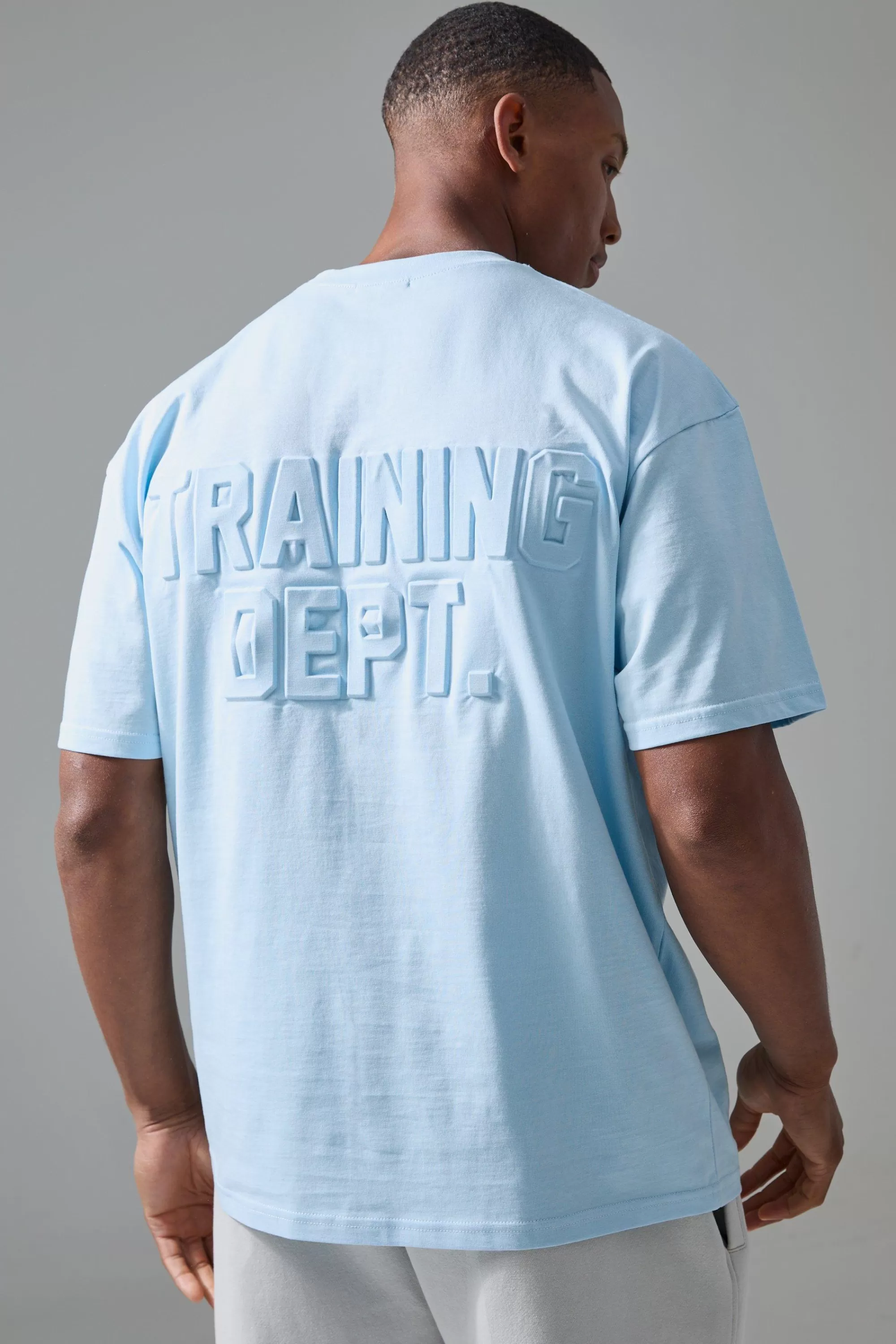 boohooMAN Man Active Training Dept Oversized Embossed T-shirt | UK blue Best
