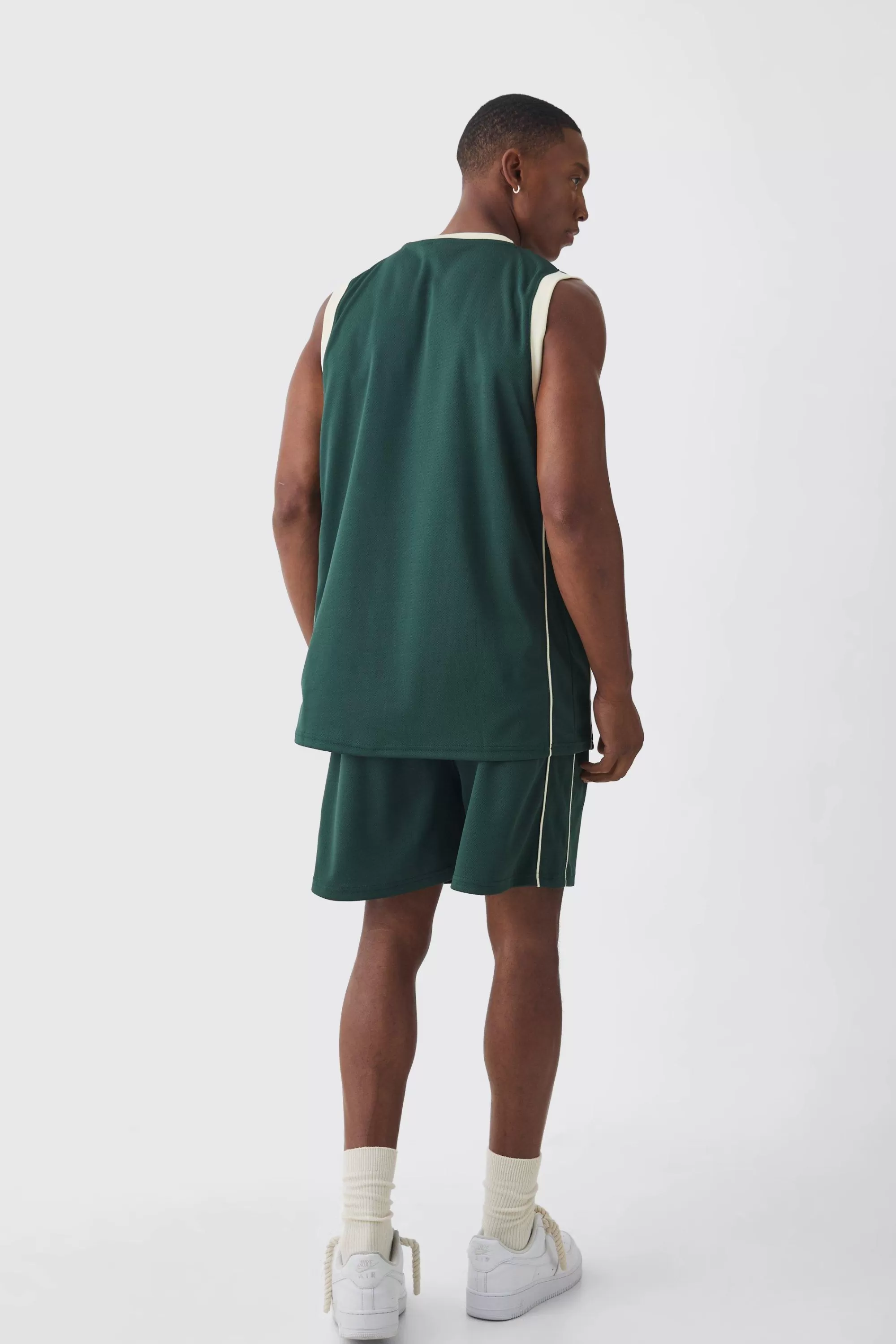 boohooMAN Mesh High Build Print & Side Panel Mesh Varsity Vest | UK forest Clearance
