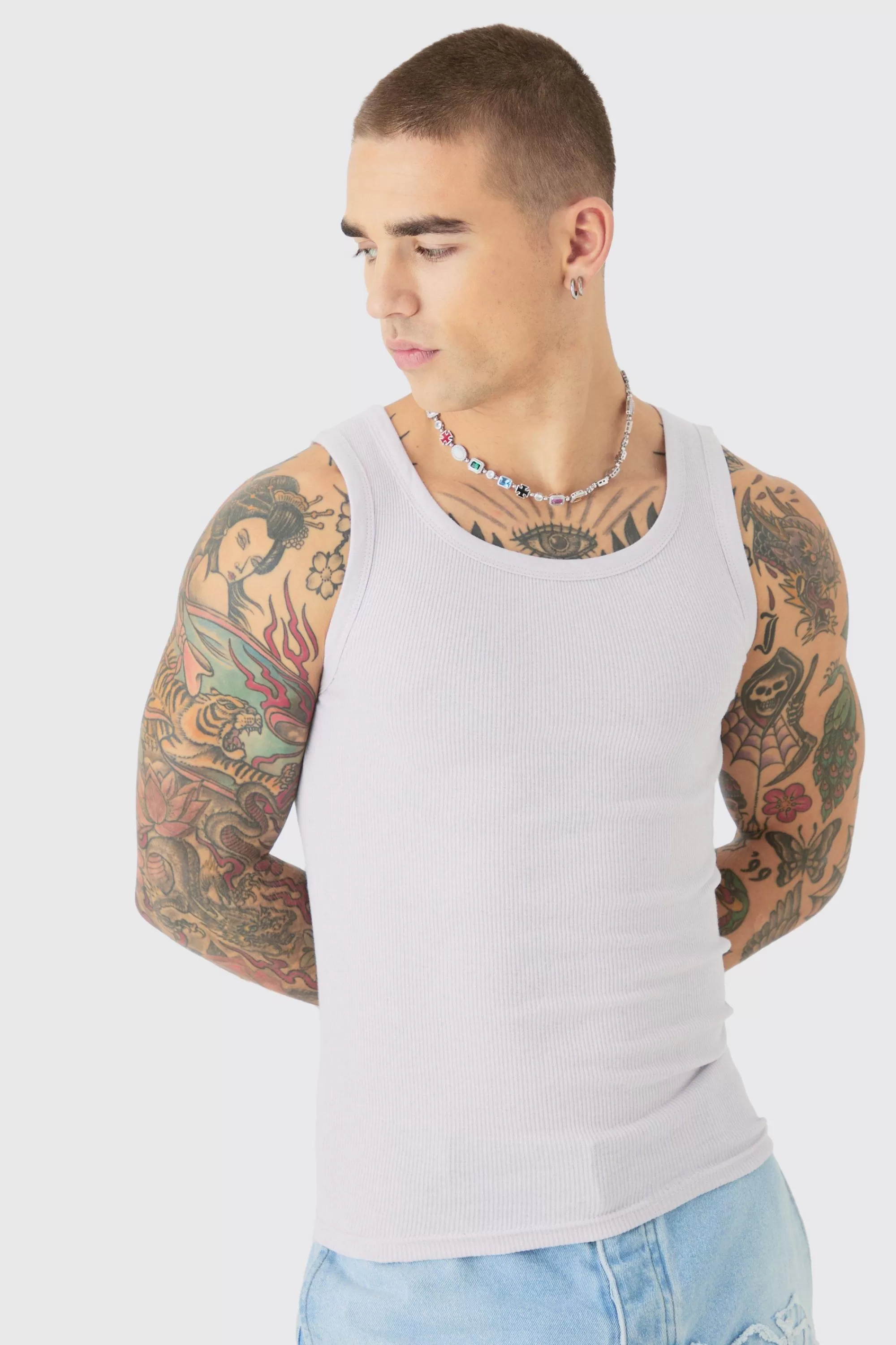 boohooMAN Muscle Fit Ribbed Vest | UK lilac Sale