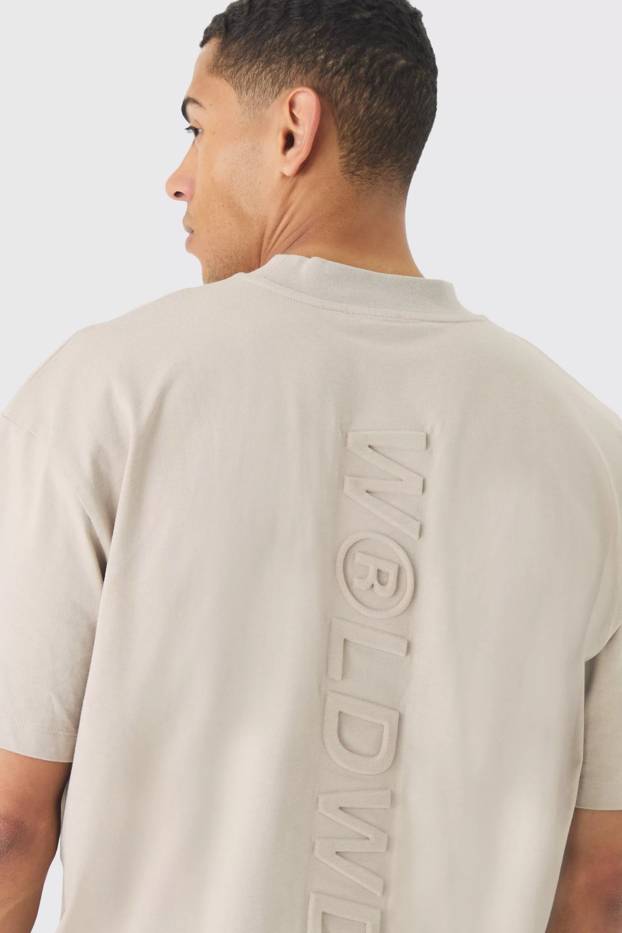 boohooMAN Oversized Extended Neck Embossed Worldwide T-shirt | UK taupe Flash Sale
