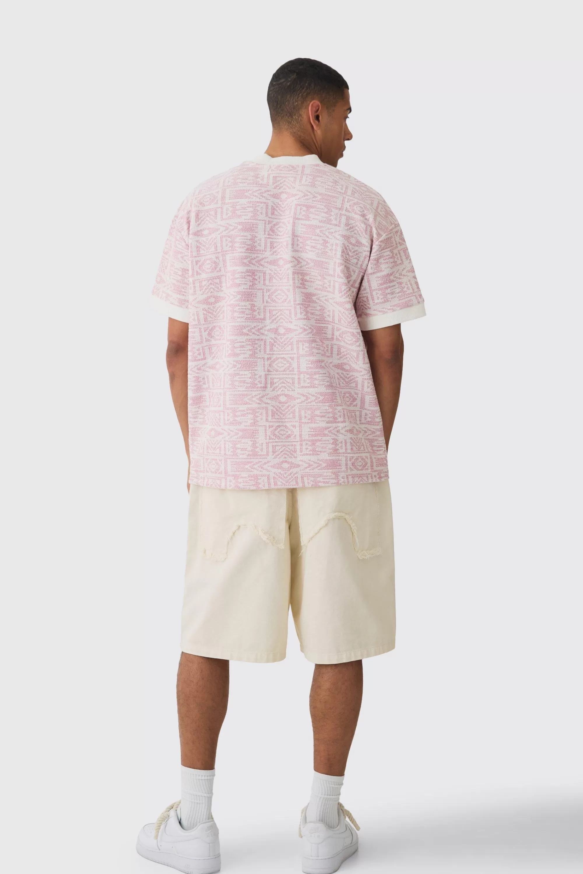 boohooMAN Oversized Extended Neck Jacquard Aztec Contrast Hems T-shirt | UK light pink Cheap