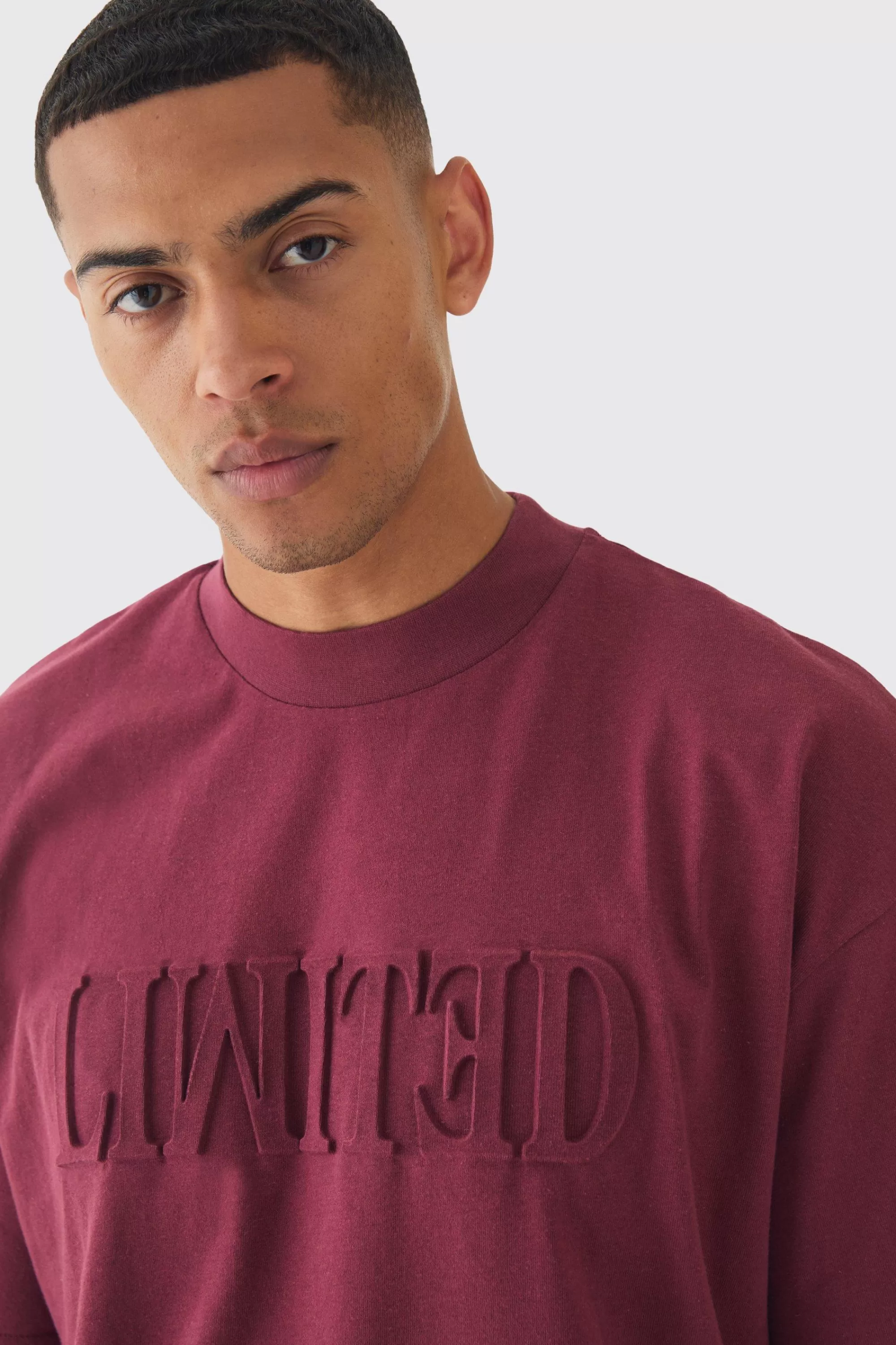 boohooMAN Oversized Extended Neck Varsity Embossed T-Shirt | UK burgundy Shop