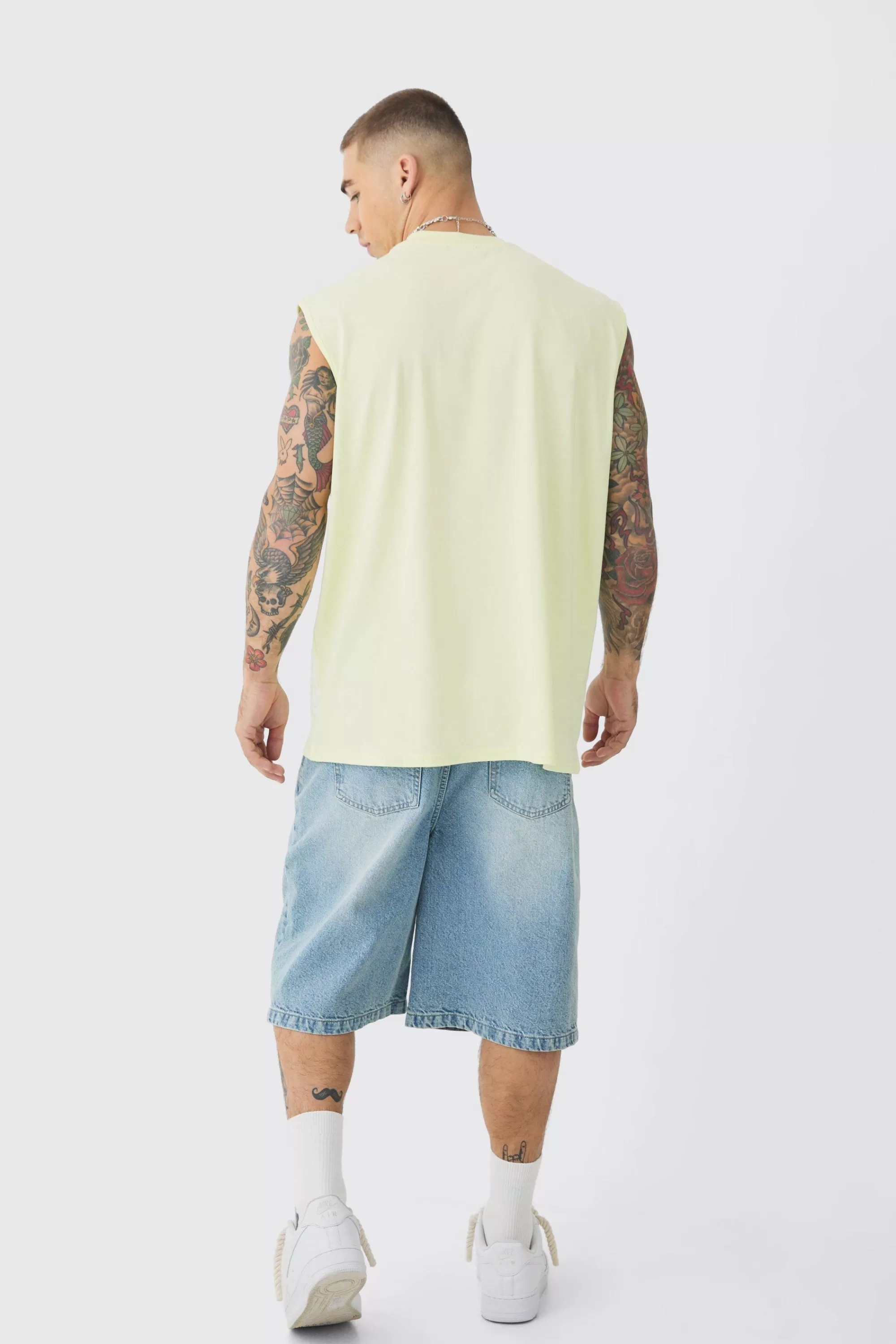 boohooMAN Oversized Faded Large Graphic Tank | UK yellow Shop