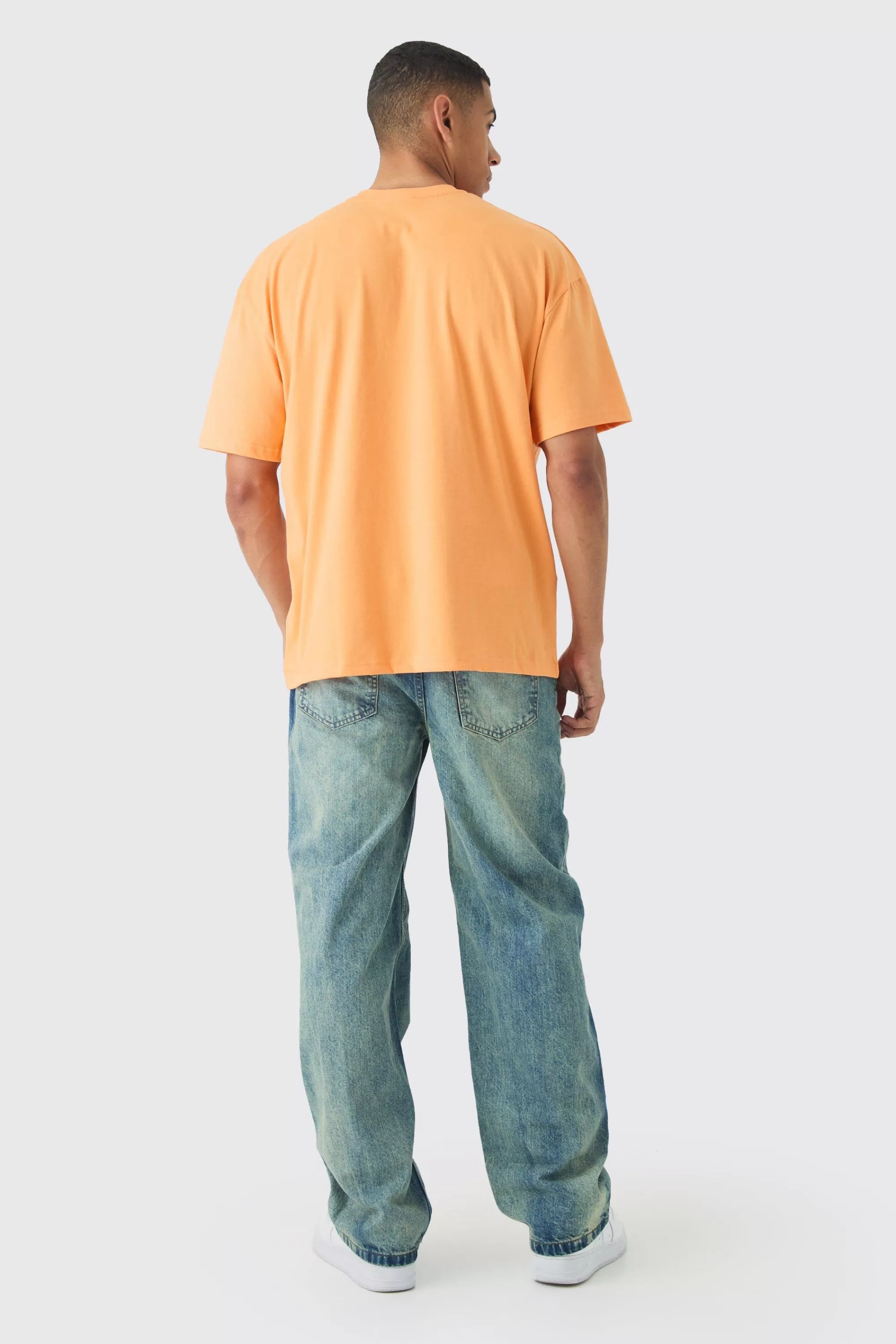 boohooMAN Oversized Faded Large Graphic T-shirt | UK orange Online