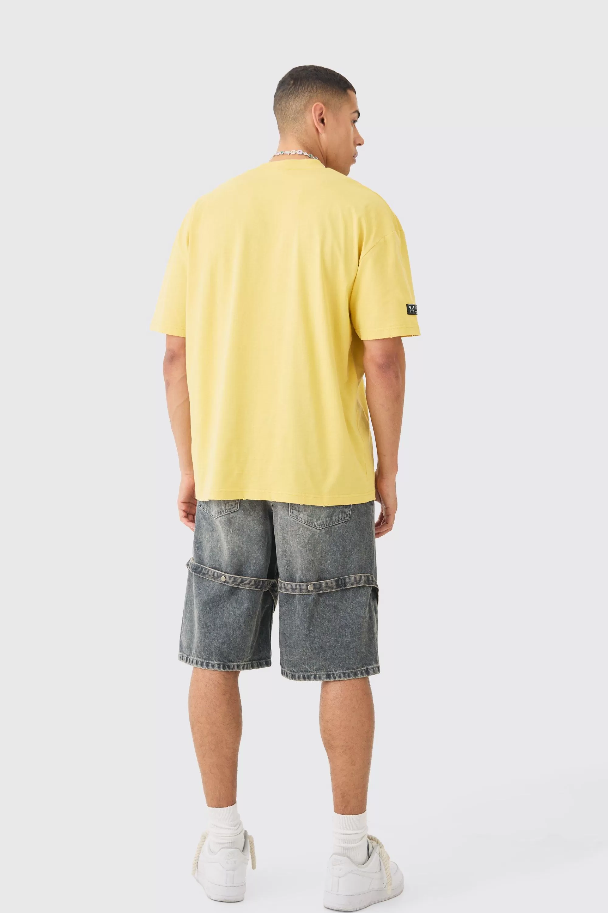 boohooMAN Oversized Official Nibbled T-shirt | UK mustard Sale