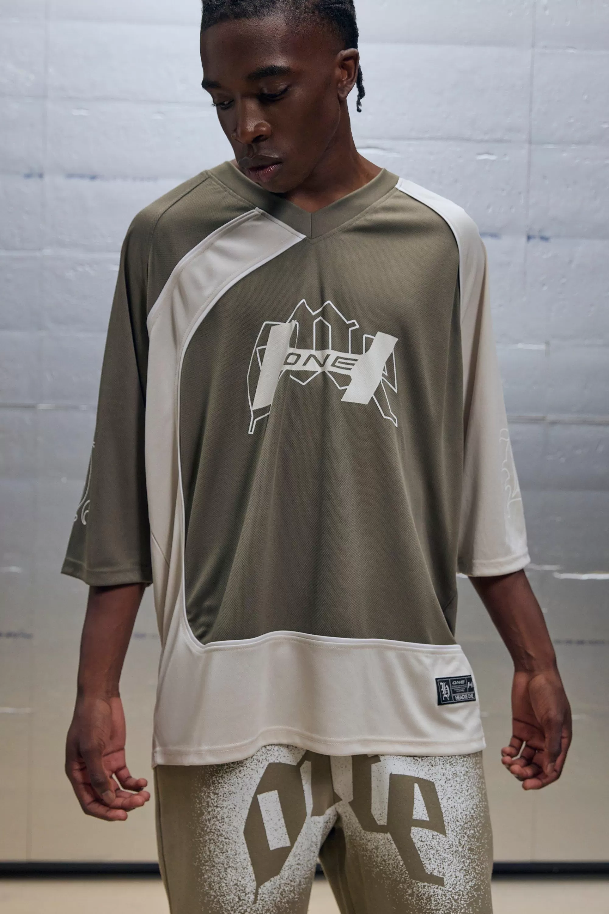 boohooMAN Regular Fit V Neck Mesh Graphic T-Shirt | UK khaki Outlet