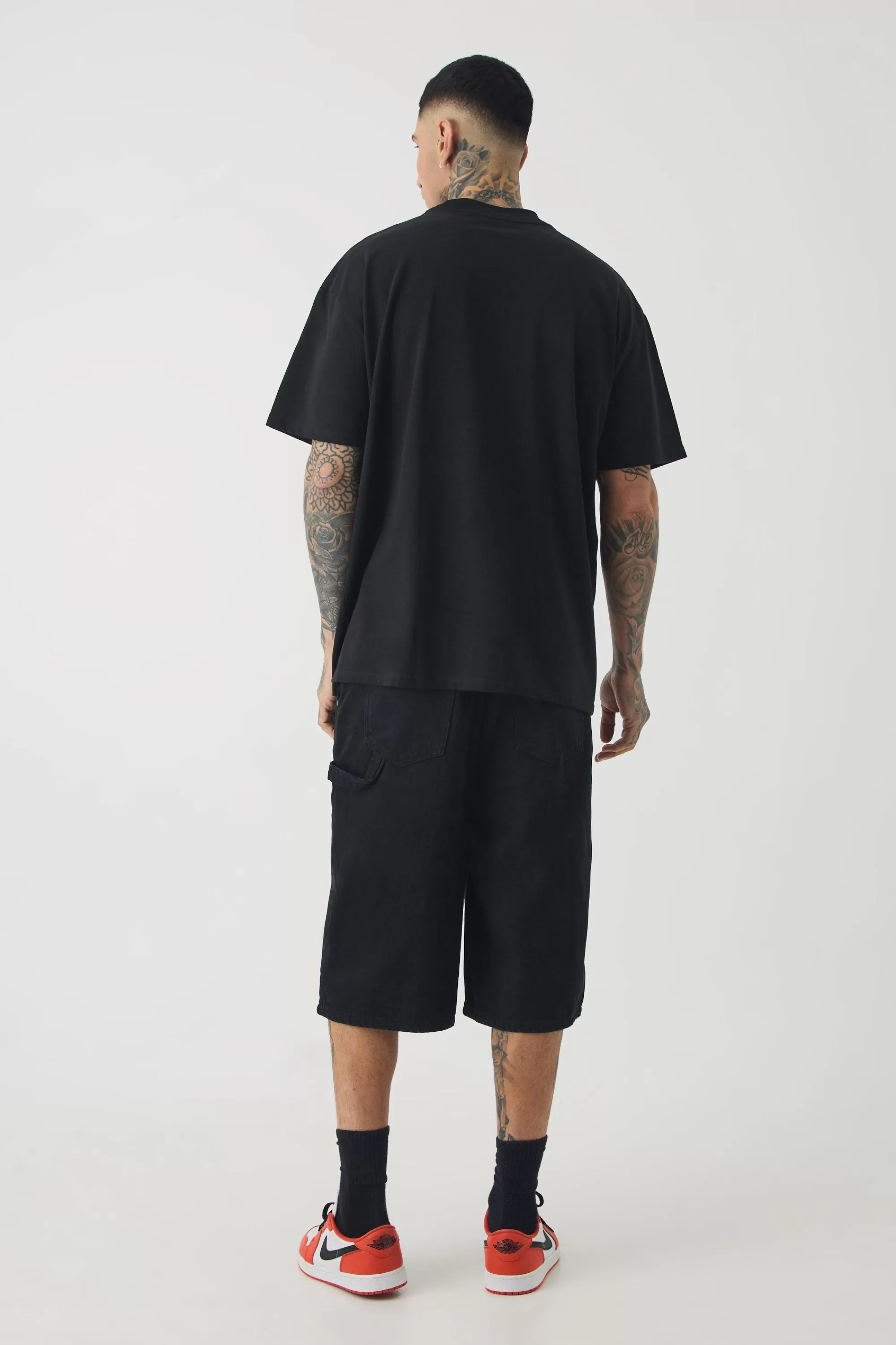boohooMAN Tall Extended Neck Flower Print T-shirt | UK black Store