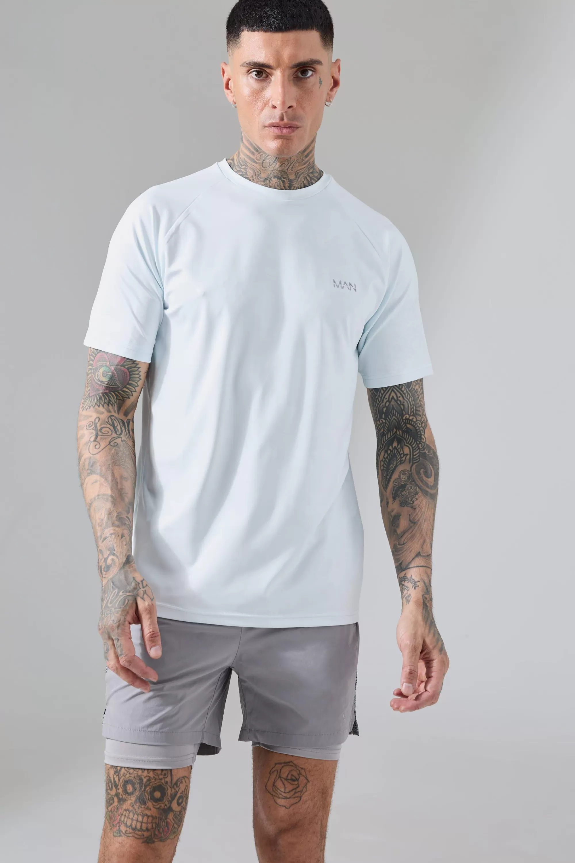 boohooMAN Tall Man Active Camo Raglan Performance T-shirt | UK blue Clearance
