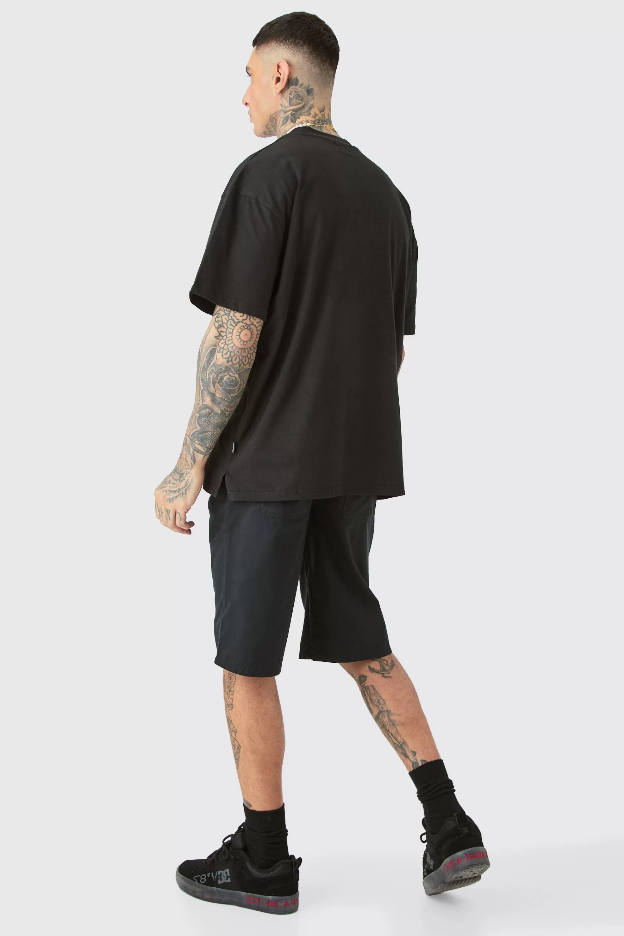 boohooMAN Tall Oversized Heavy Split Hem Print T-shirt | UK black Shop
