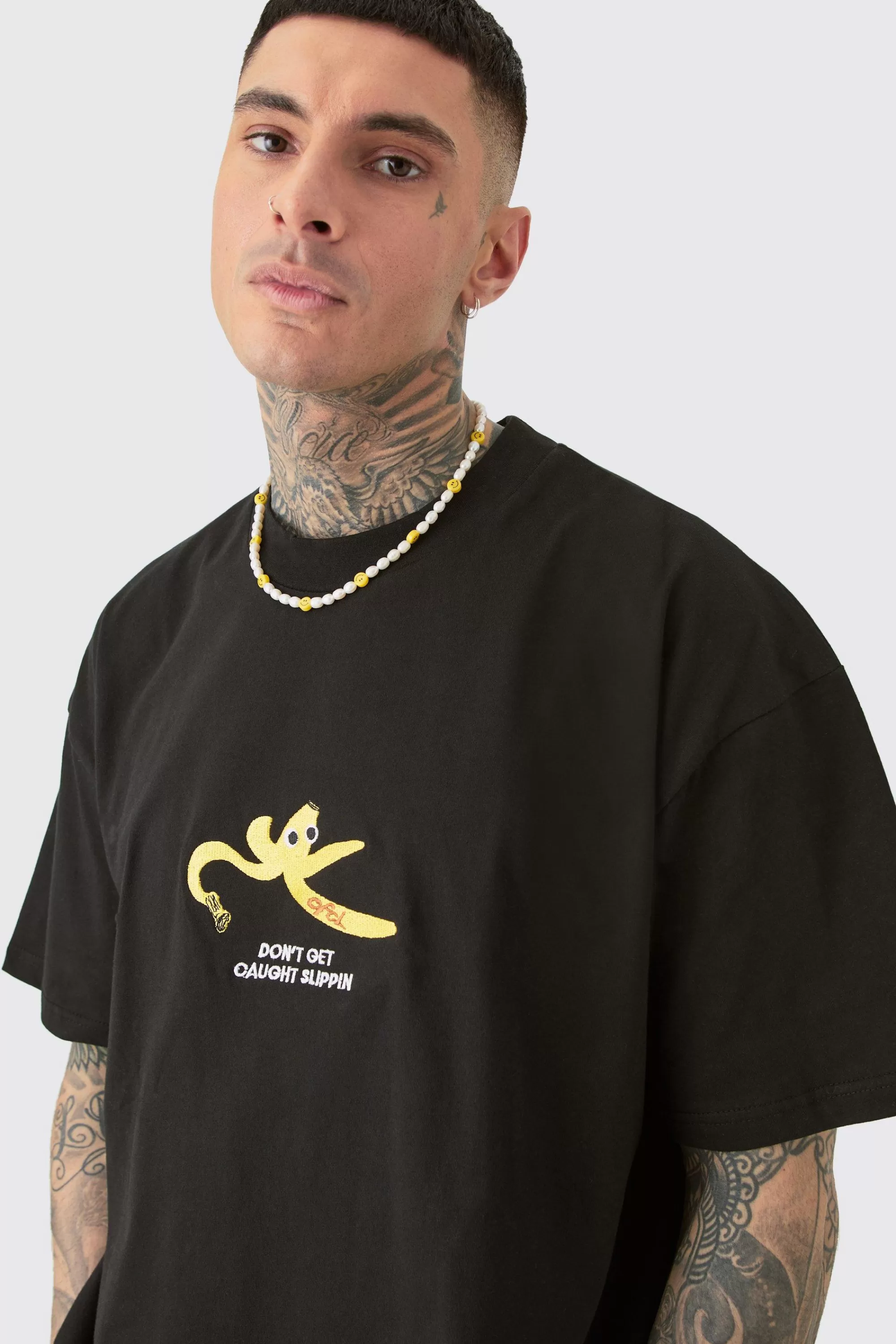 boohooMAN Tall Oversized Heavy Split Hem Print T-shirt | UK black Shop
